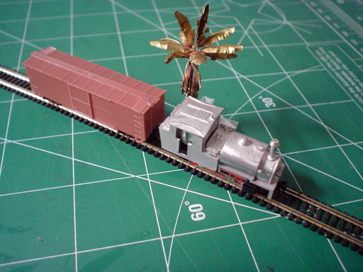 Brass banana tree next to a Nn3 train I’m building.