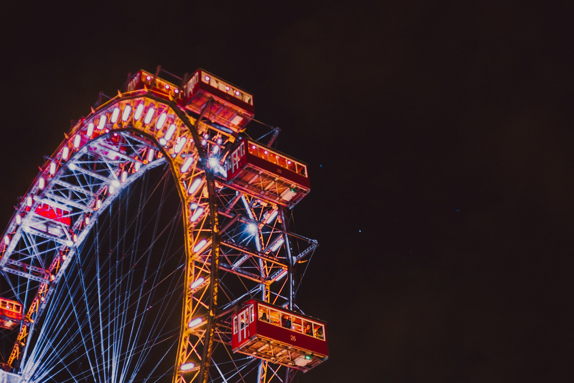 Casual destination engagement photos inspired by "Before Sunrise" movie locations, the Viennese Giant Ferris Wheel at the Prater, Innere Stadt, Vienna, Austria, August 2017, Sony A7RII.