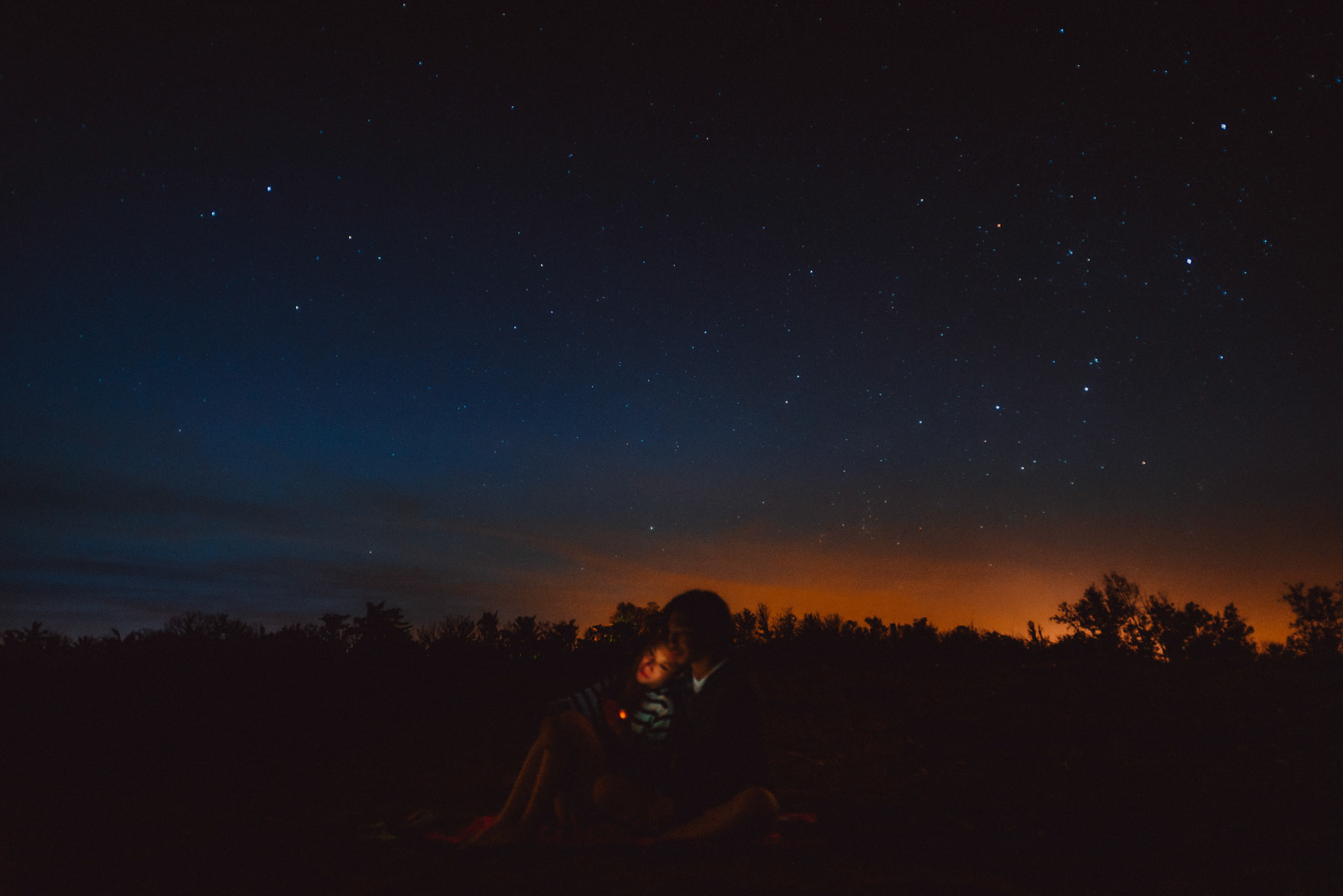 Cozy couple portraits by the beach moments before sunrise, from Koke and Pam's chill and outdoorsy prenup photoshoot in Bonuan Beach, Dagupan, Pangasinan, Philippines, Southeast Asia, November 2015, Sony A7S.