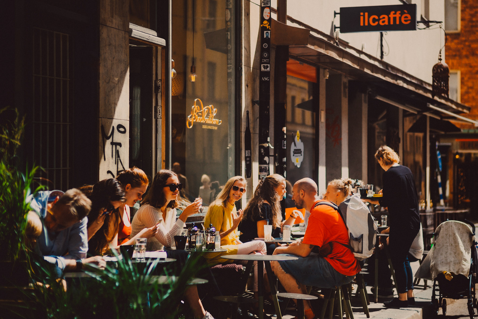 Swedes having coffee outside Il Caffé Söder, Stockholm, Sweden, July 2016, Leica M.