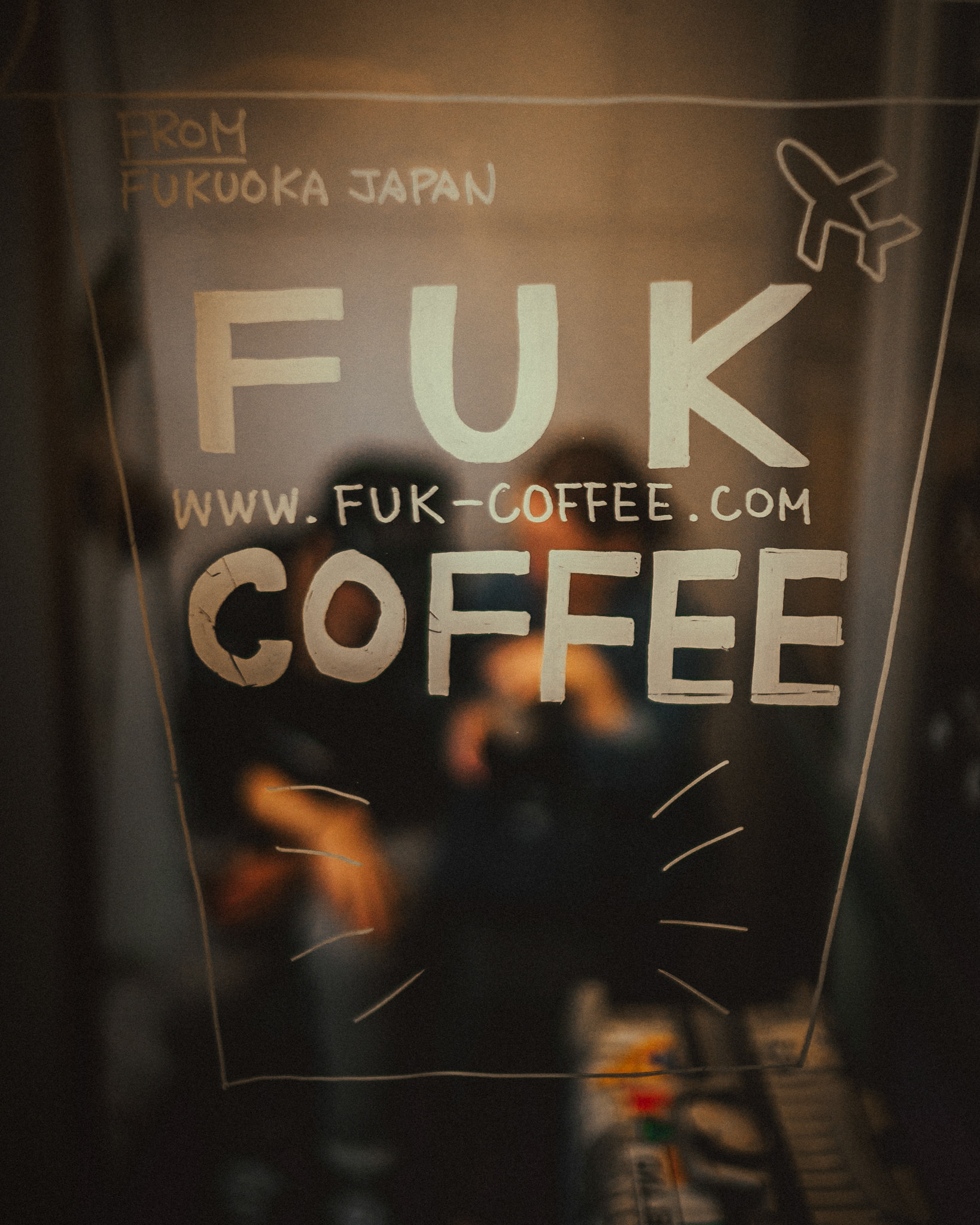 Candid pre-wedding and engagement portraits outside FUK Coffee in Fukuoka, Japan, October 2018, Sony A7SII.