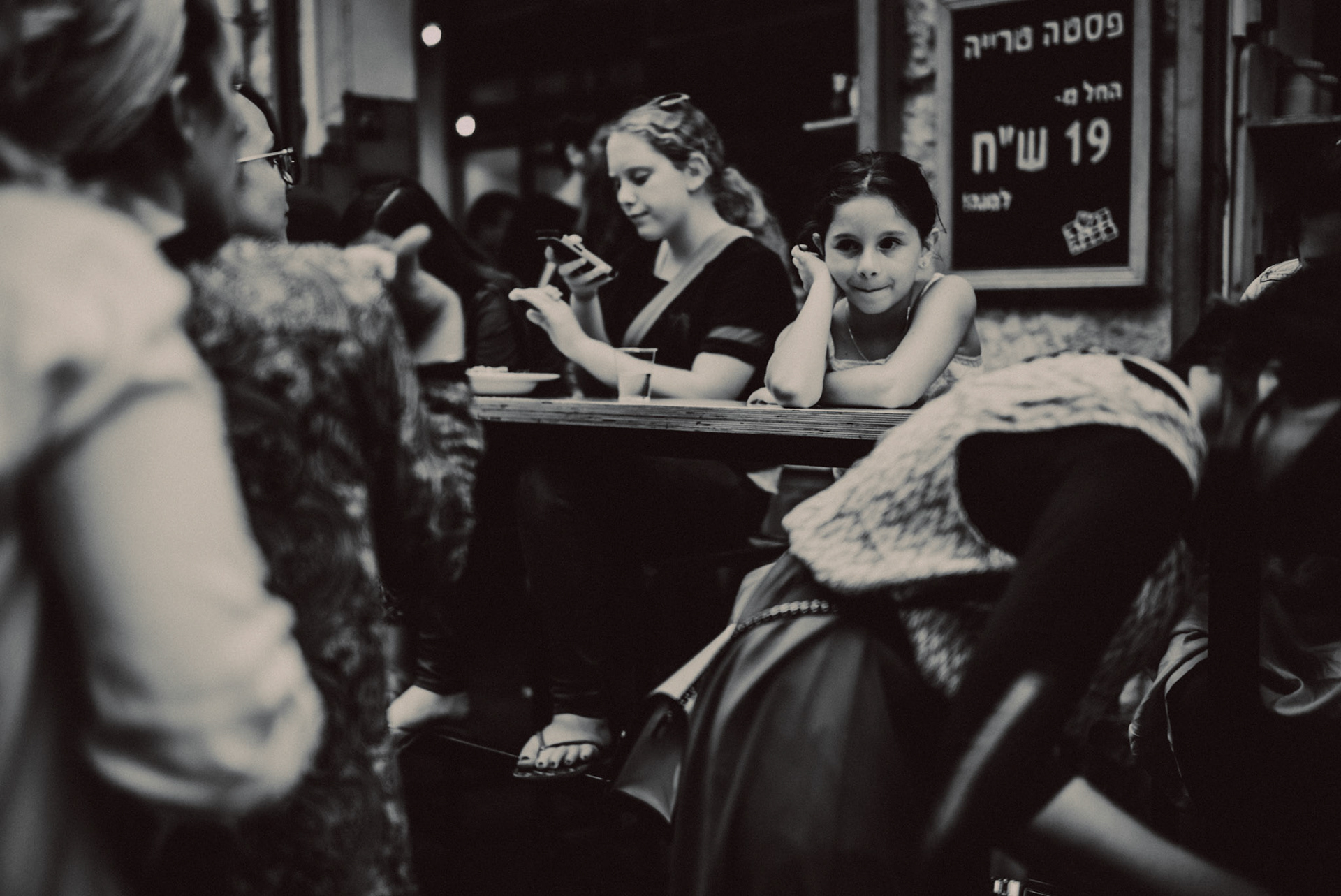 A little girl in Mahane Yehuda Market, in black and white, Jerusalem, Israel, July 2015, Leica M.