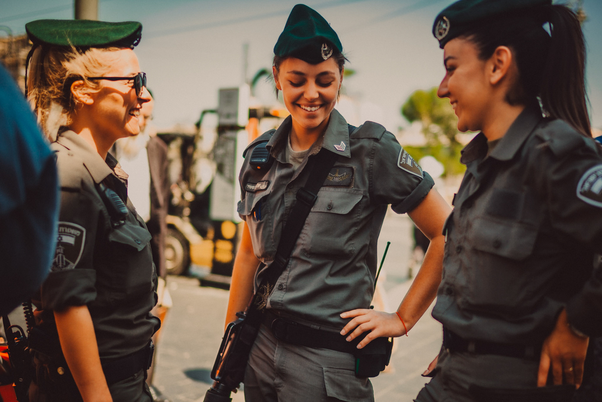 Women from the Israel Defense Forces in Mahane Yehuda Market. Jerusalem, Israel. July 2015