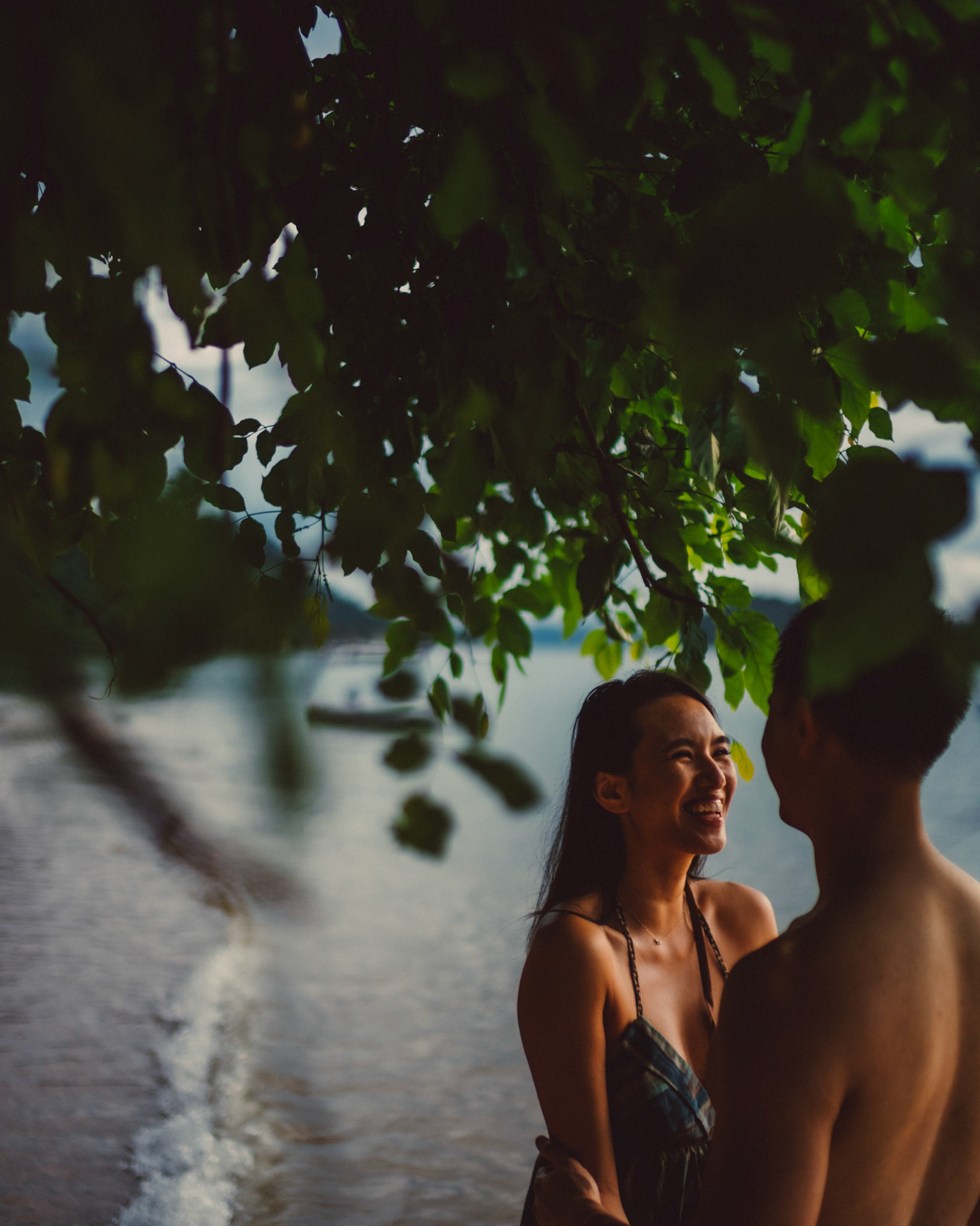 Intimate moments under a tree in front of Panorama Resort, from George and Allie's honeymoon portrait shoot in Corong-Corong Beach, El Nido, Palawan, Philippines, Southeast Asia, December 2018, Sony A7III