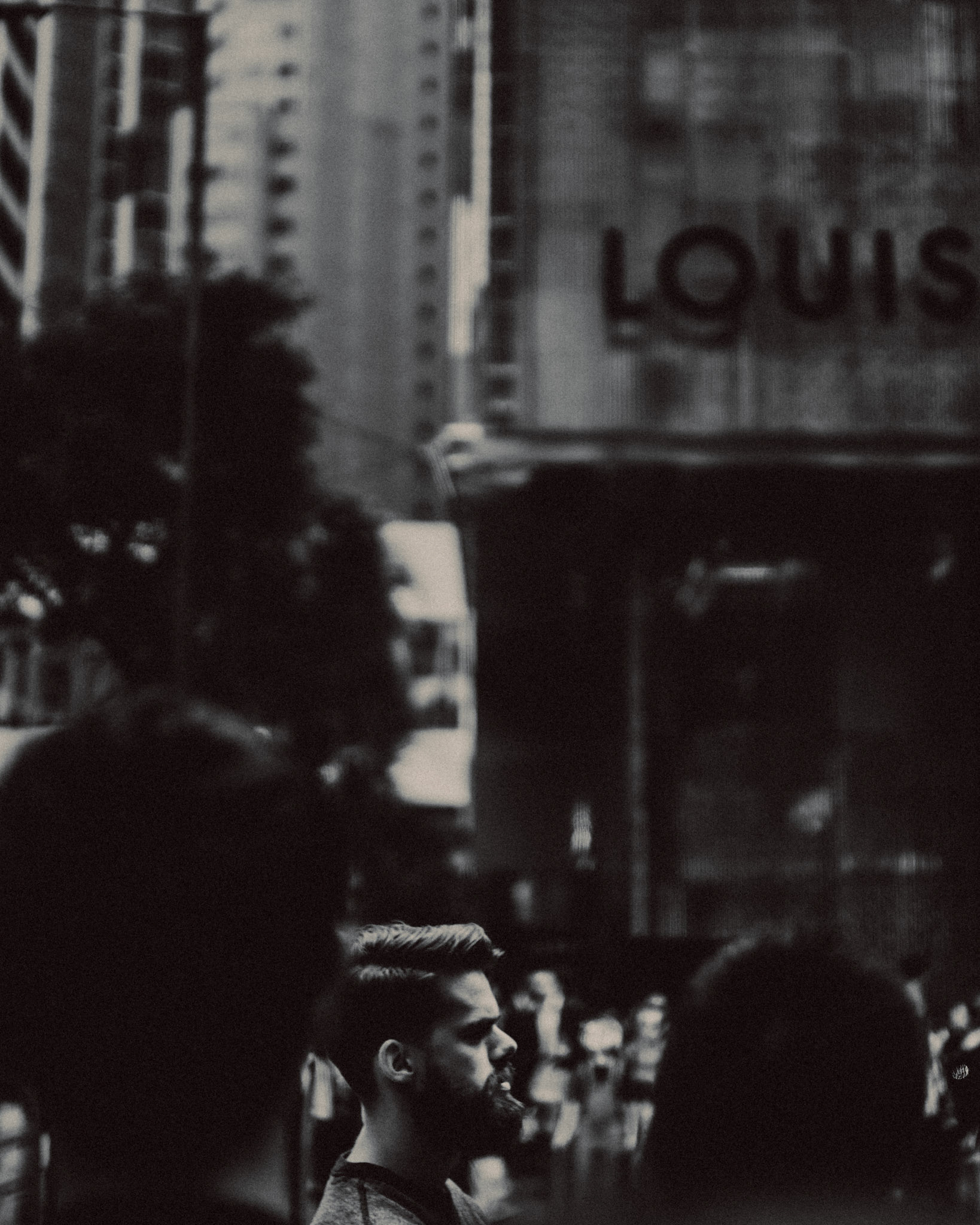 A Westerner outside Louis Vuitton in Central, Hong Kong, January 2016, Leica M.