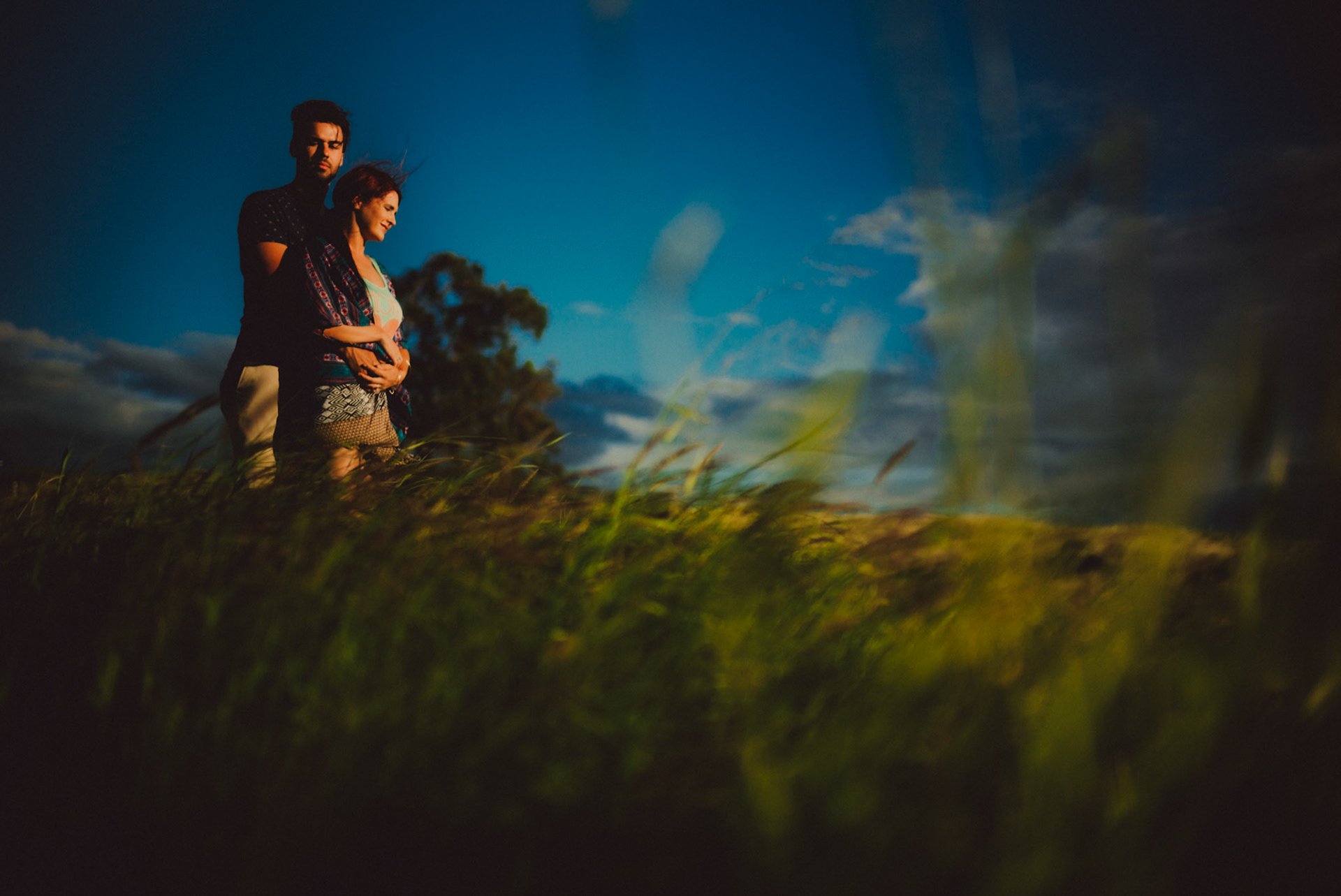 Warm sunlight at a grassy meadow, from Ryan and Angela's adventure couple shoot in Hawaii, USA, September 2015, Leica M.