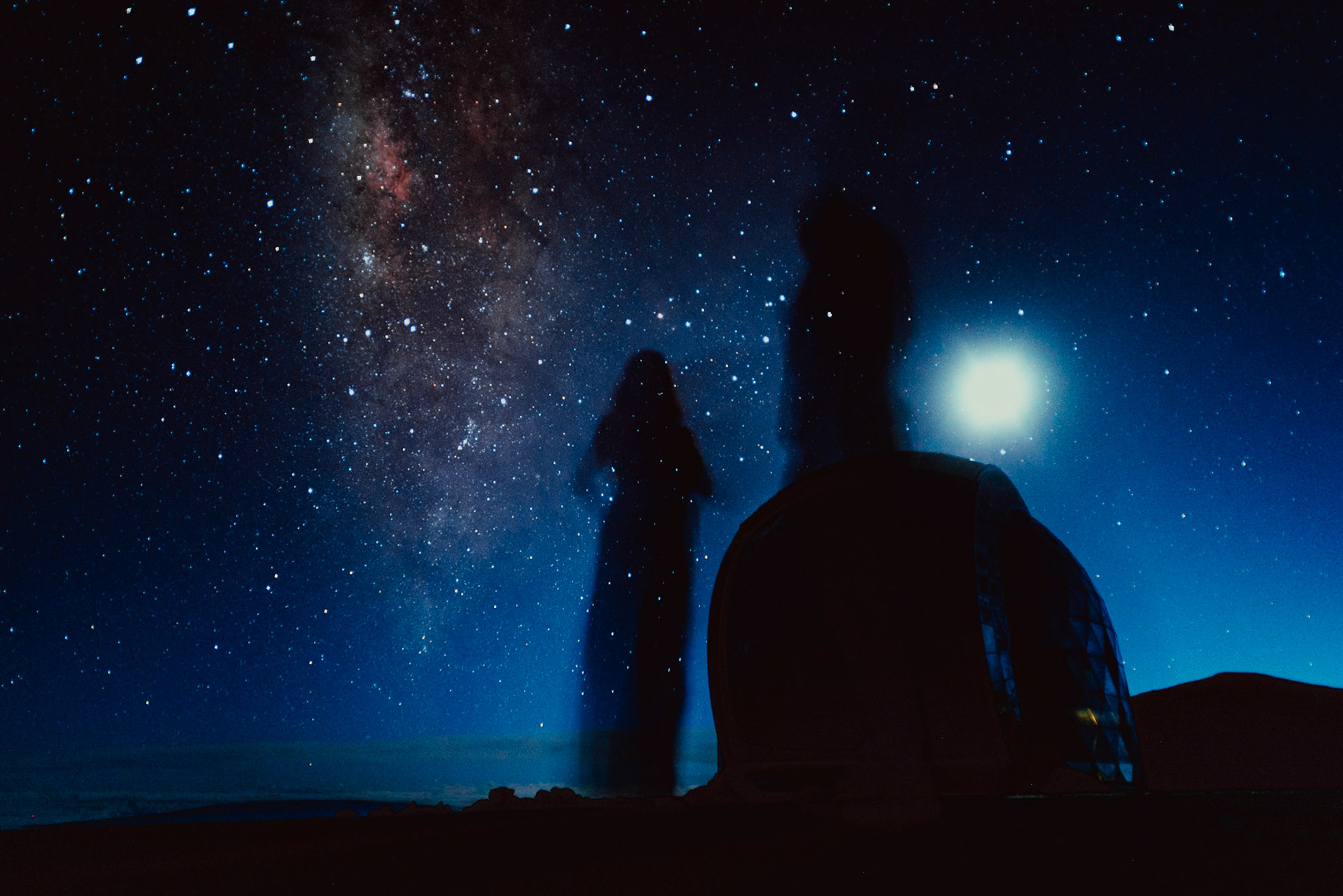 Two silhouettes against the night sky, Keck Observatory and the Milky Way, Hilo, Hawaii, USA, September 2015, Sony A7S.