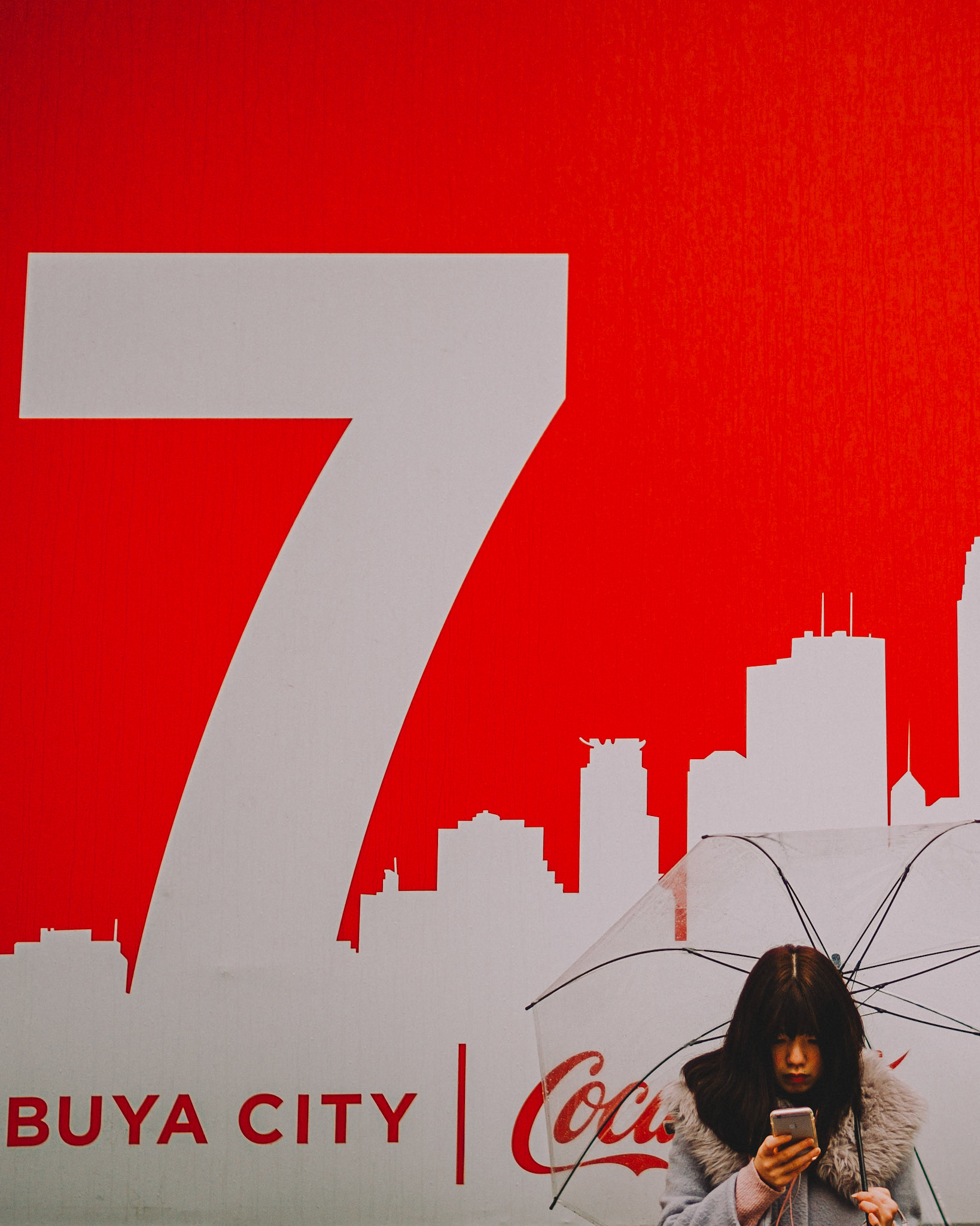 A Japanese girl with a transparent umbrella in Shibuya Crossing, Tokyo, Japan, December 2016, Leica M.