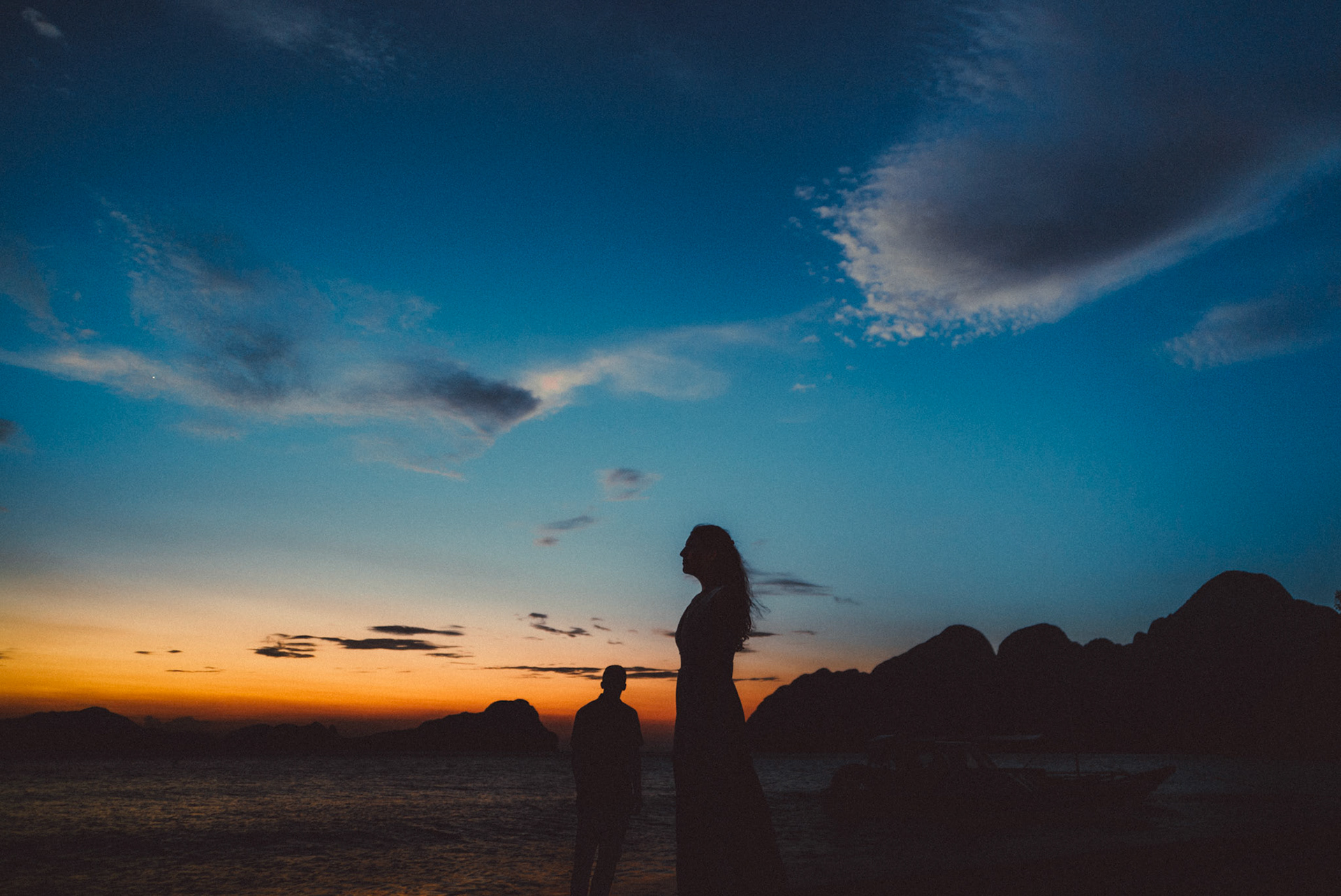 Golden Hour couple silhouettes in Ipil Beach 2, from Peter &amp; Alexis' adventure engagement in El Nido, Palawan, Philippines, Southeast Asia, April 2018, Sony A7SII