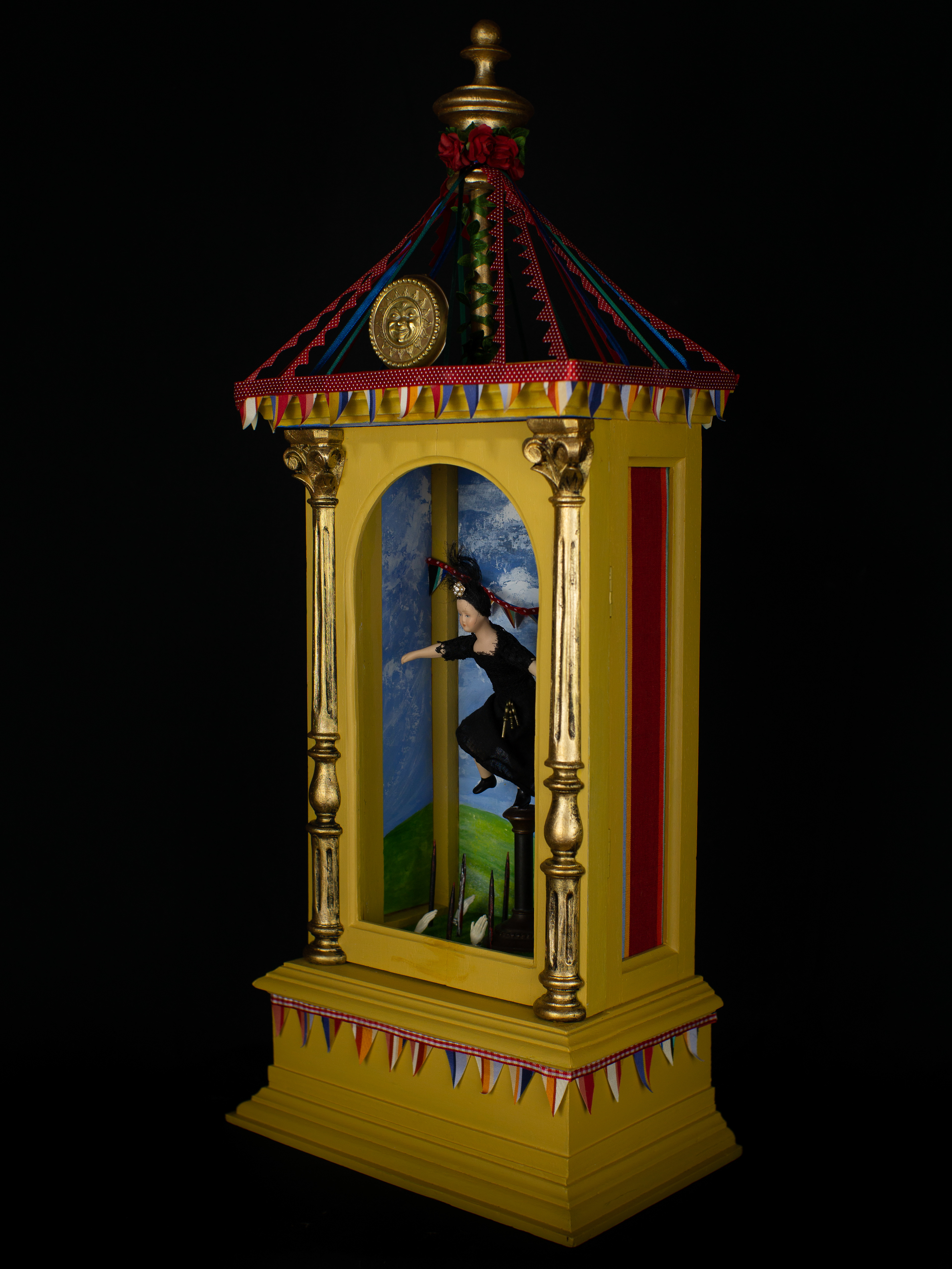 The Balancing Act - Refurbished antique wooden case, vintage miniature doll, brass, bronze and other metals, glass, paint, wood and textiles. 64 x 20 x 16
