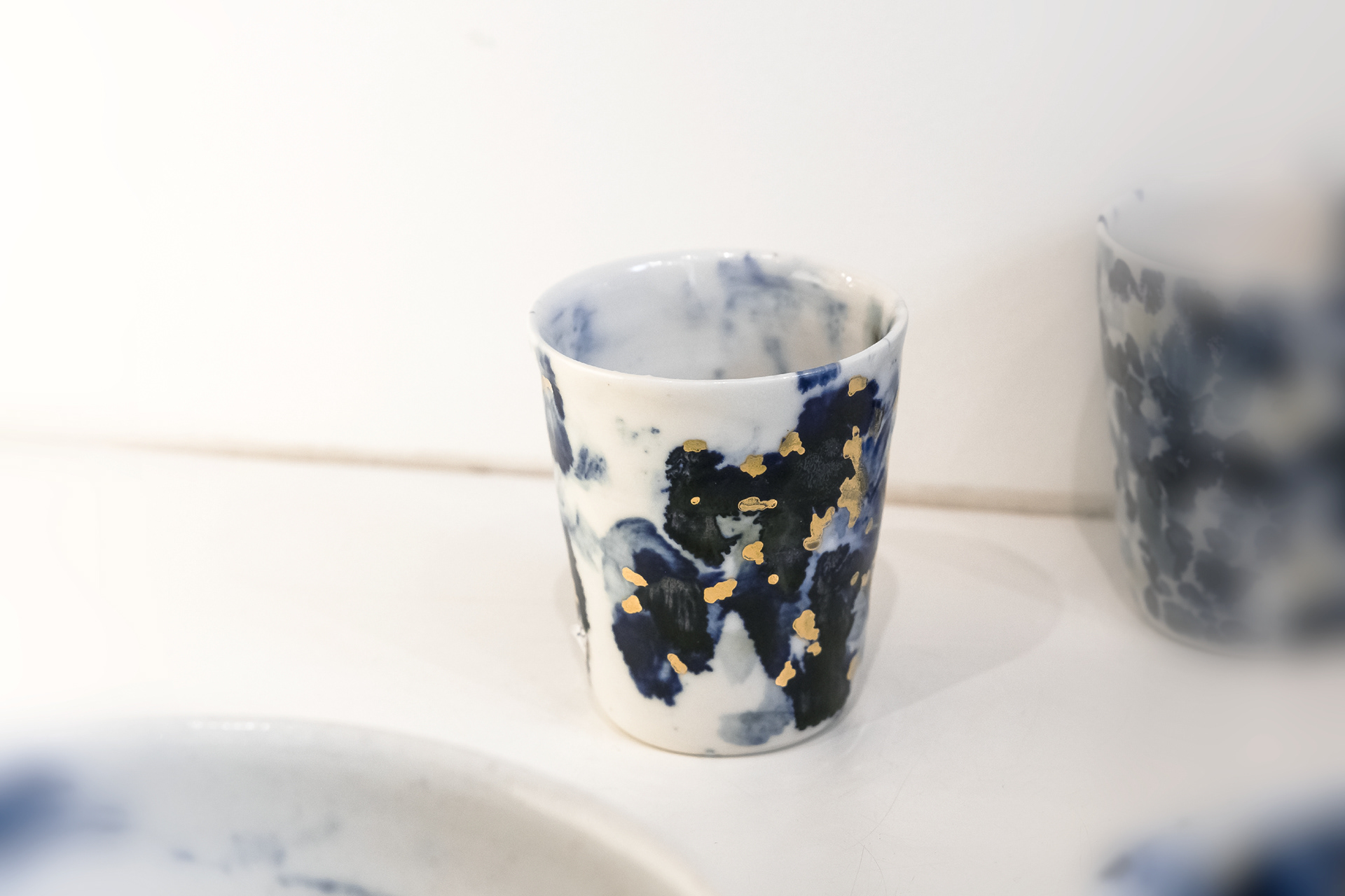 Tasse en porcelaine et or - 35€