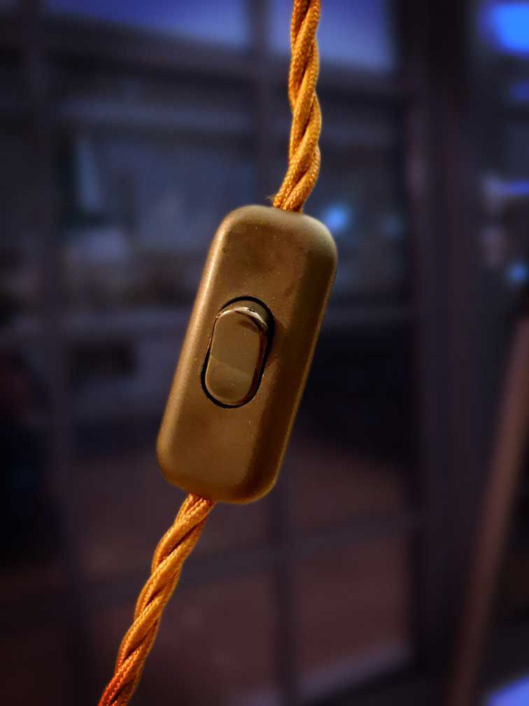 Inline switch with vintage braided cable