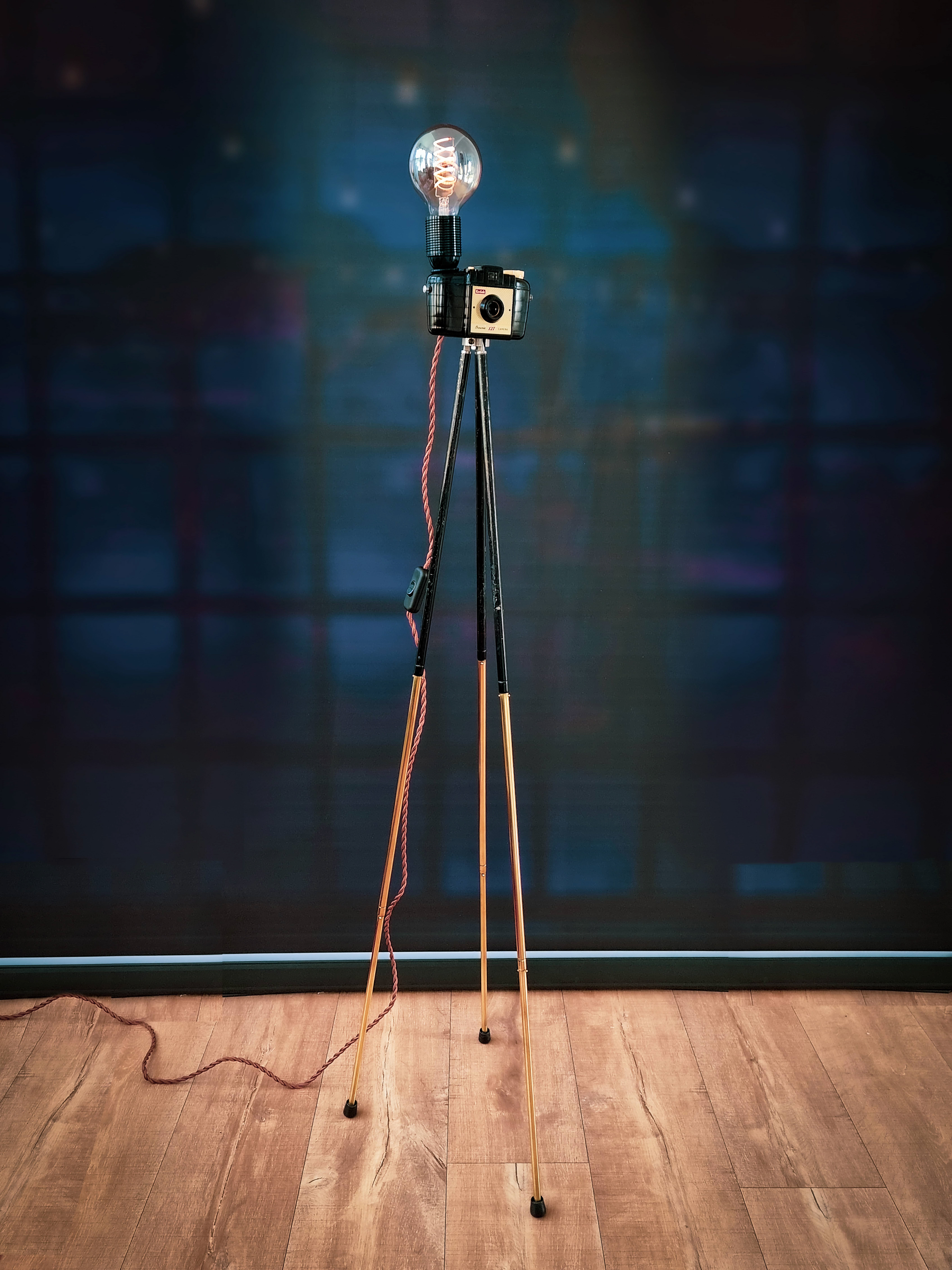 Vintage telescopic tripod with brass legs