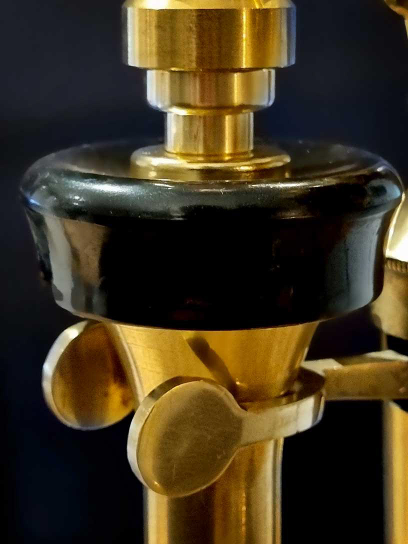 Brass earpiece with Bakelite cap