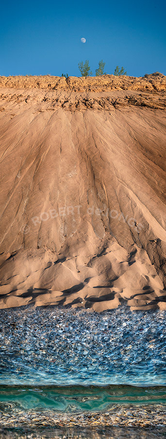 The sand bluffs of Sleeping Bear Point. Into the water and the moon above