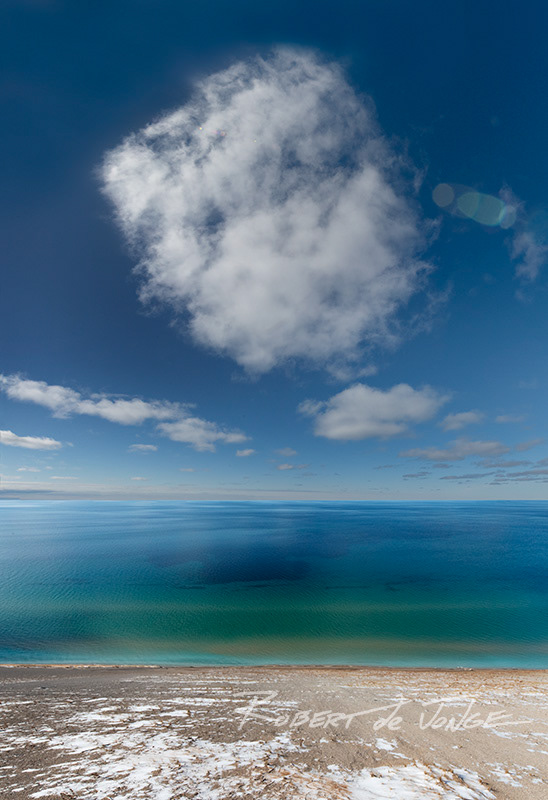 Curious cloud formations near the Pierce Stocking Lake Michigan Scenic Overlook — Winter