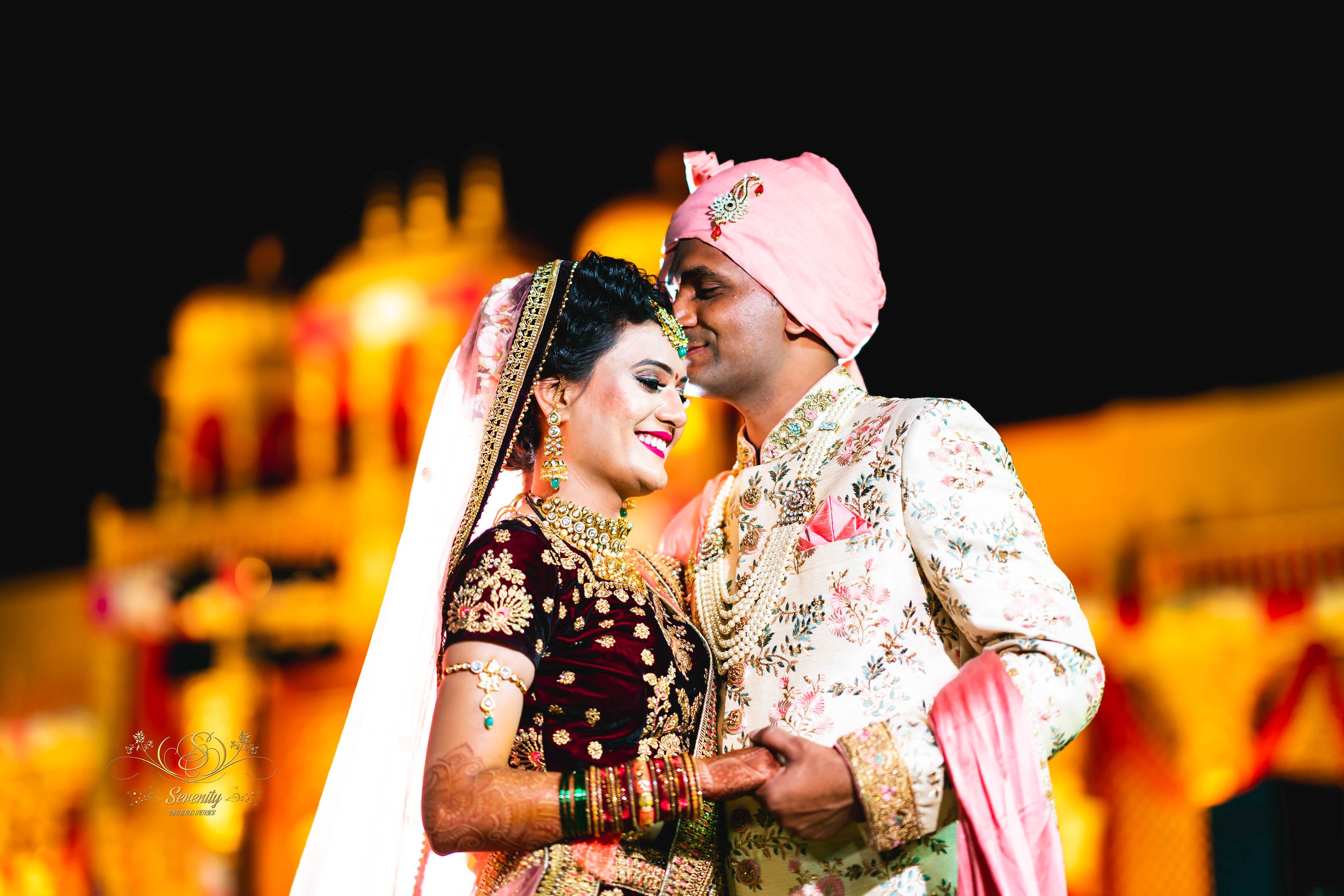 Groom Omkar Kissing forehead of Bride Bhagyashree in their big fat Indian Wedding| Image Clicked by best Wedding photographer in Pune | India