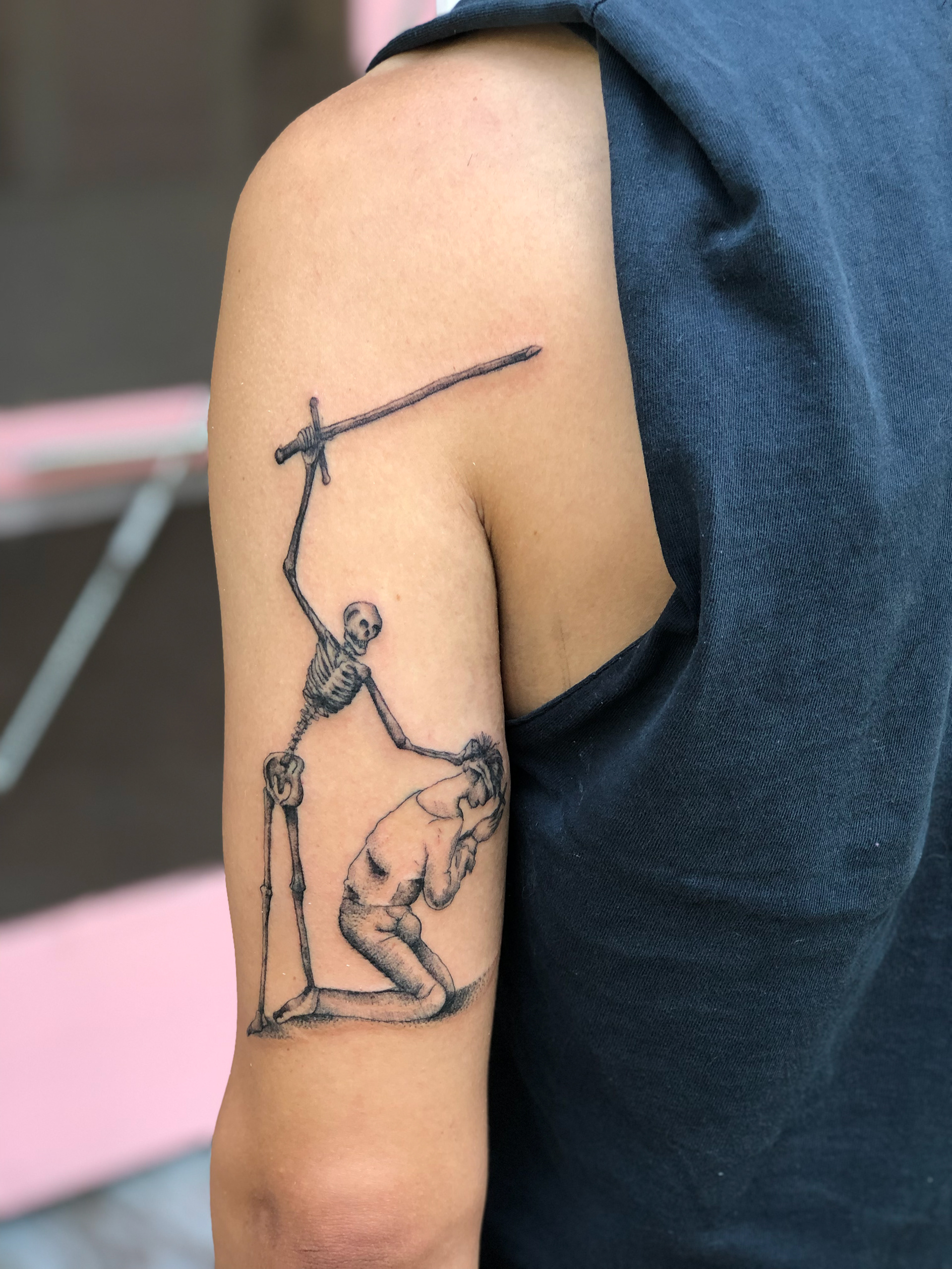 Fine line, black and grey piece my client came up with from an old medieval painting.