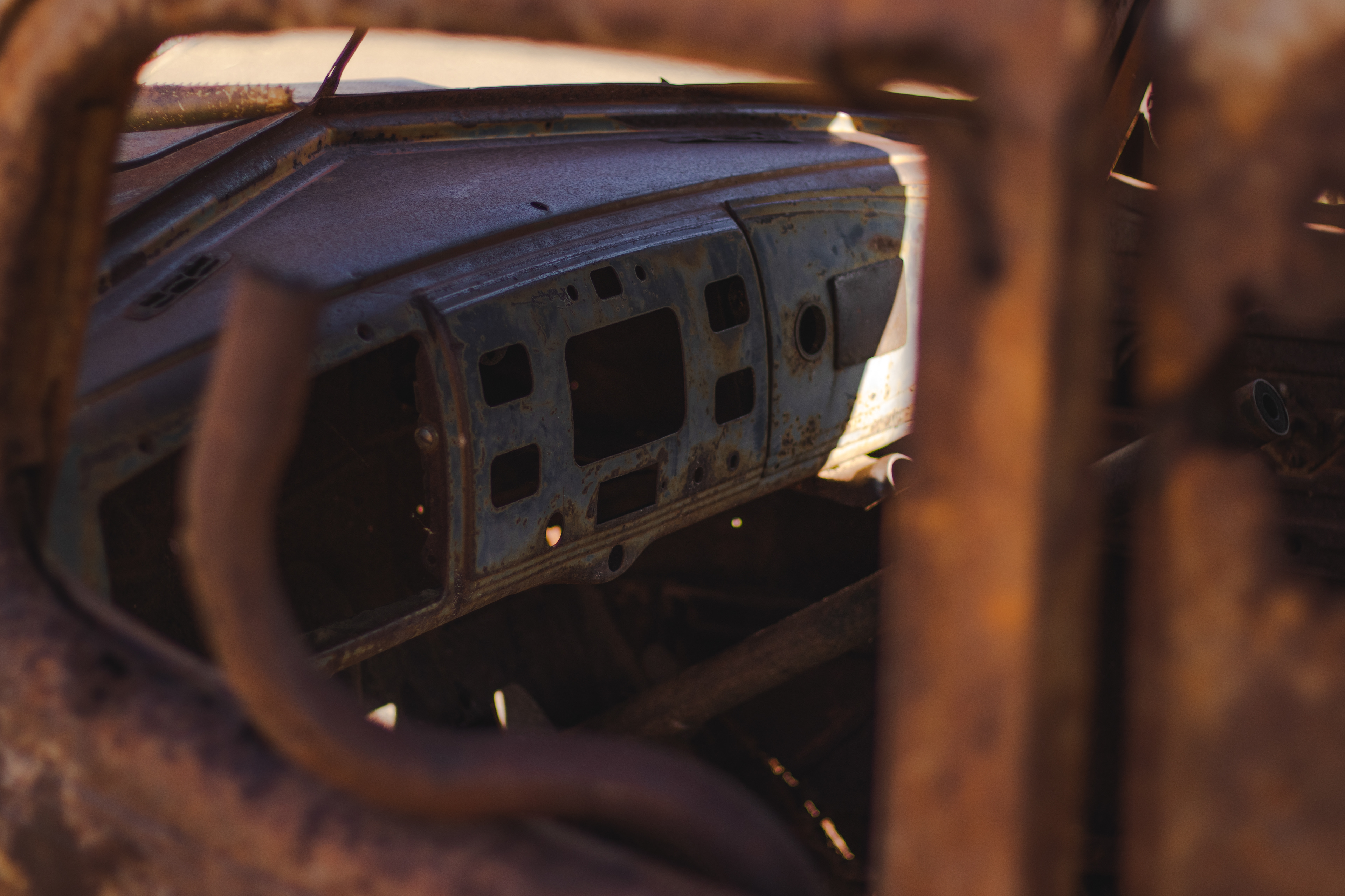 Photo of dashboard of rusty old car