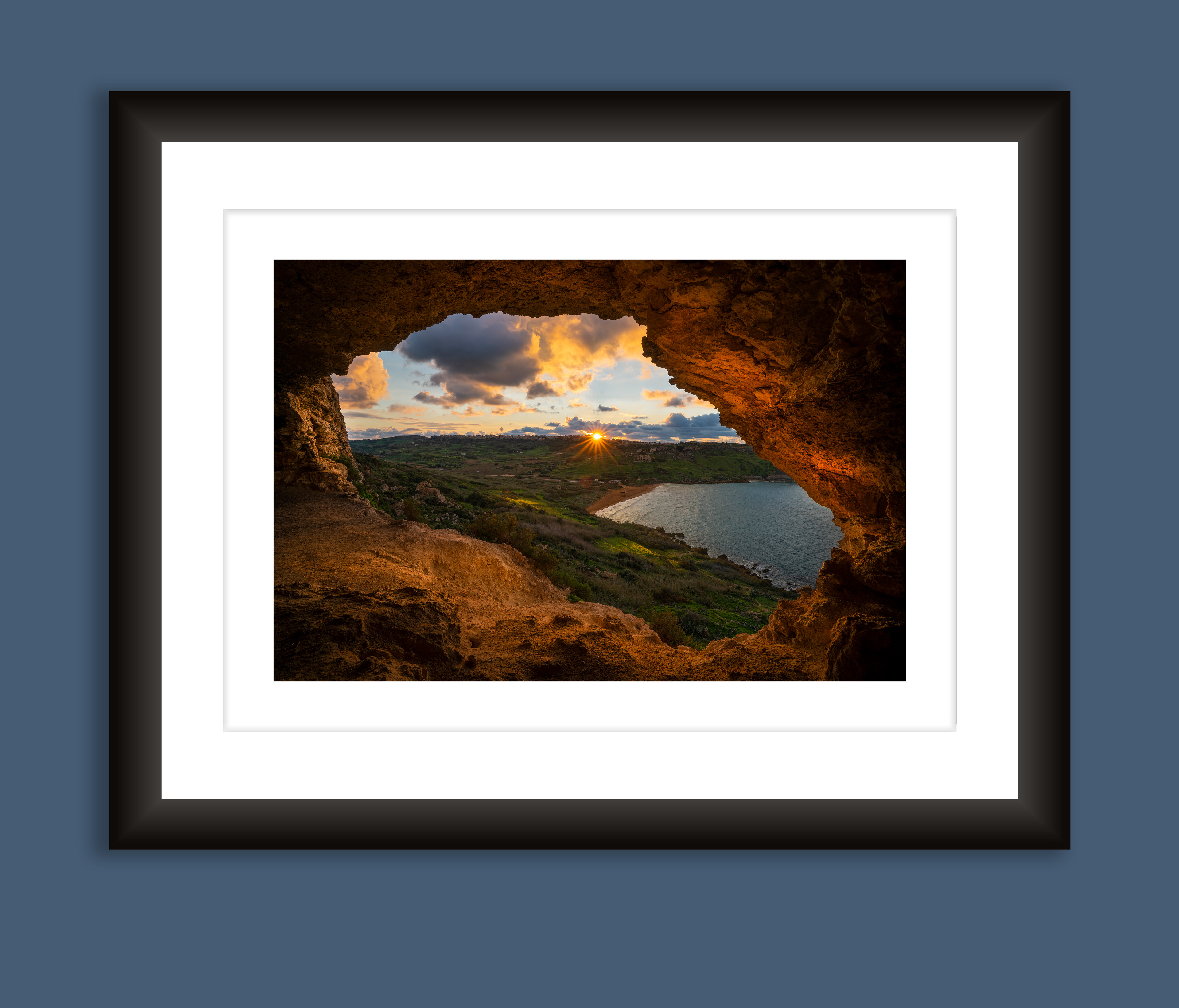 A beautiful framed fine art print of Mixta cave during sunset in Gozo