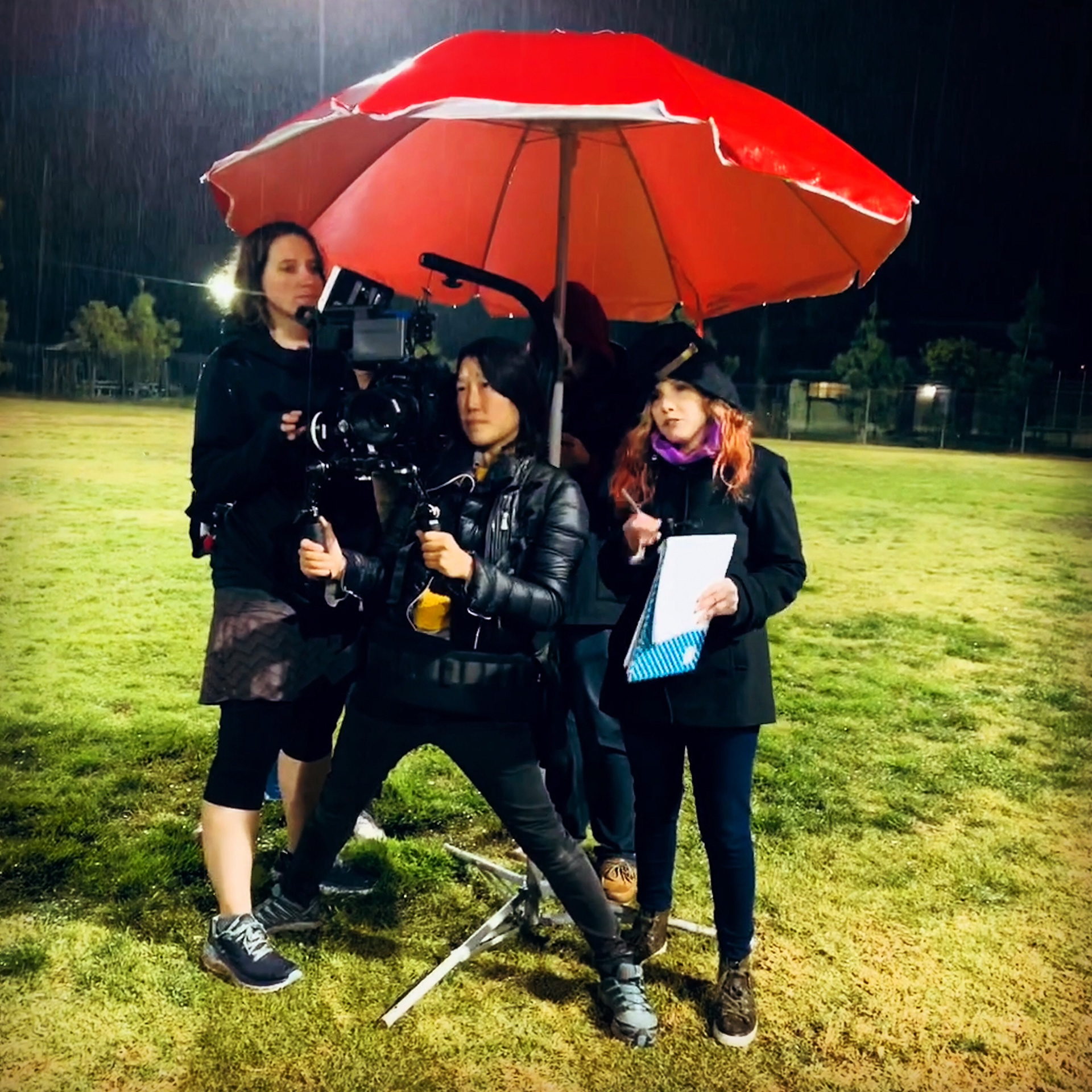 Filming on a baseball diamond in the rain for Adidas Girls Breaking Barriers in Sports.