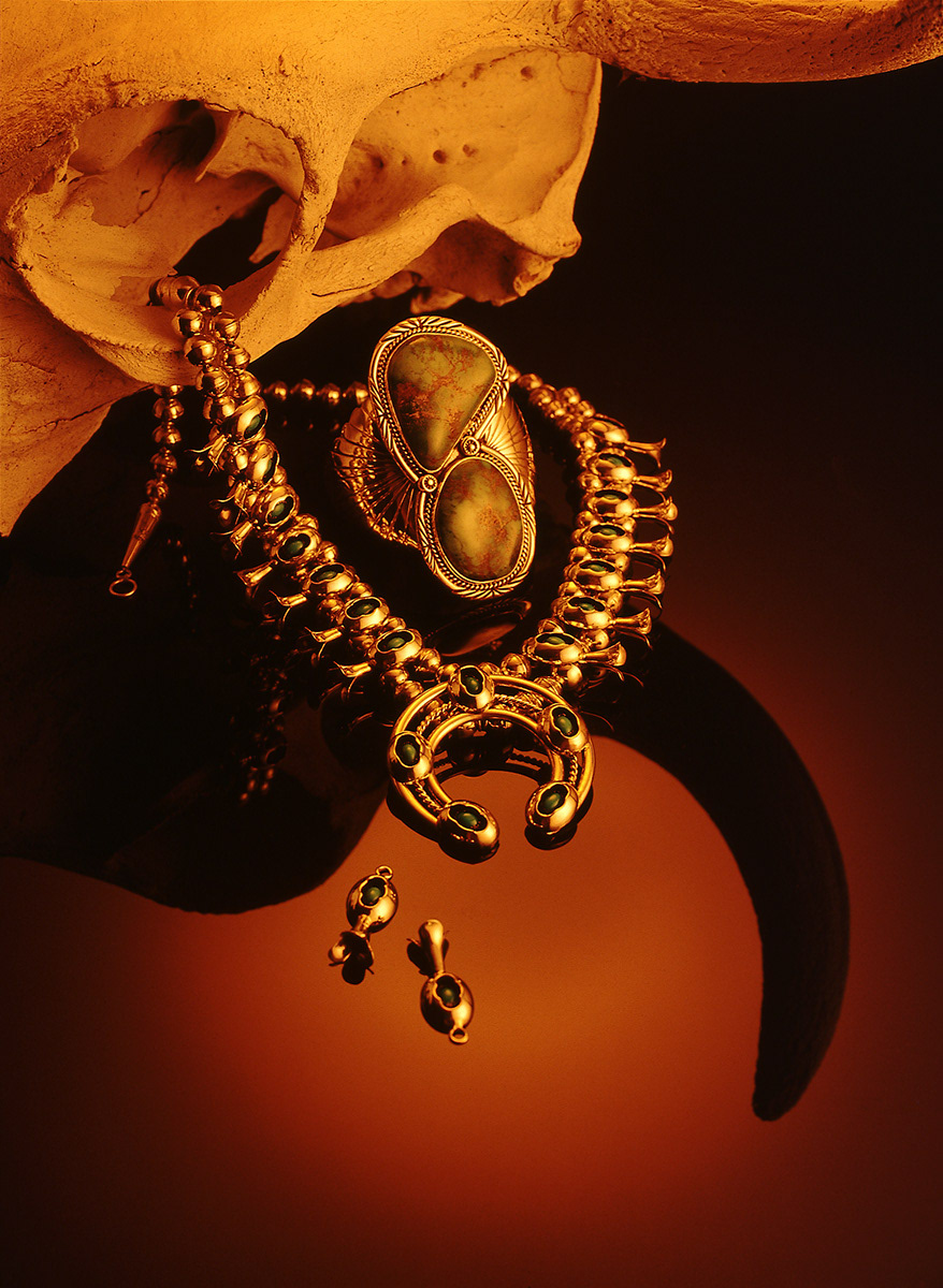 Squash Blossom silver necklace with cowskull still life | Photo © Scott Weaver