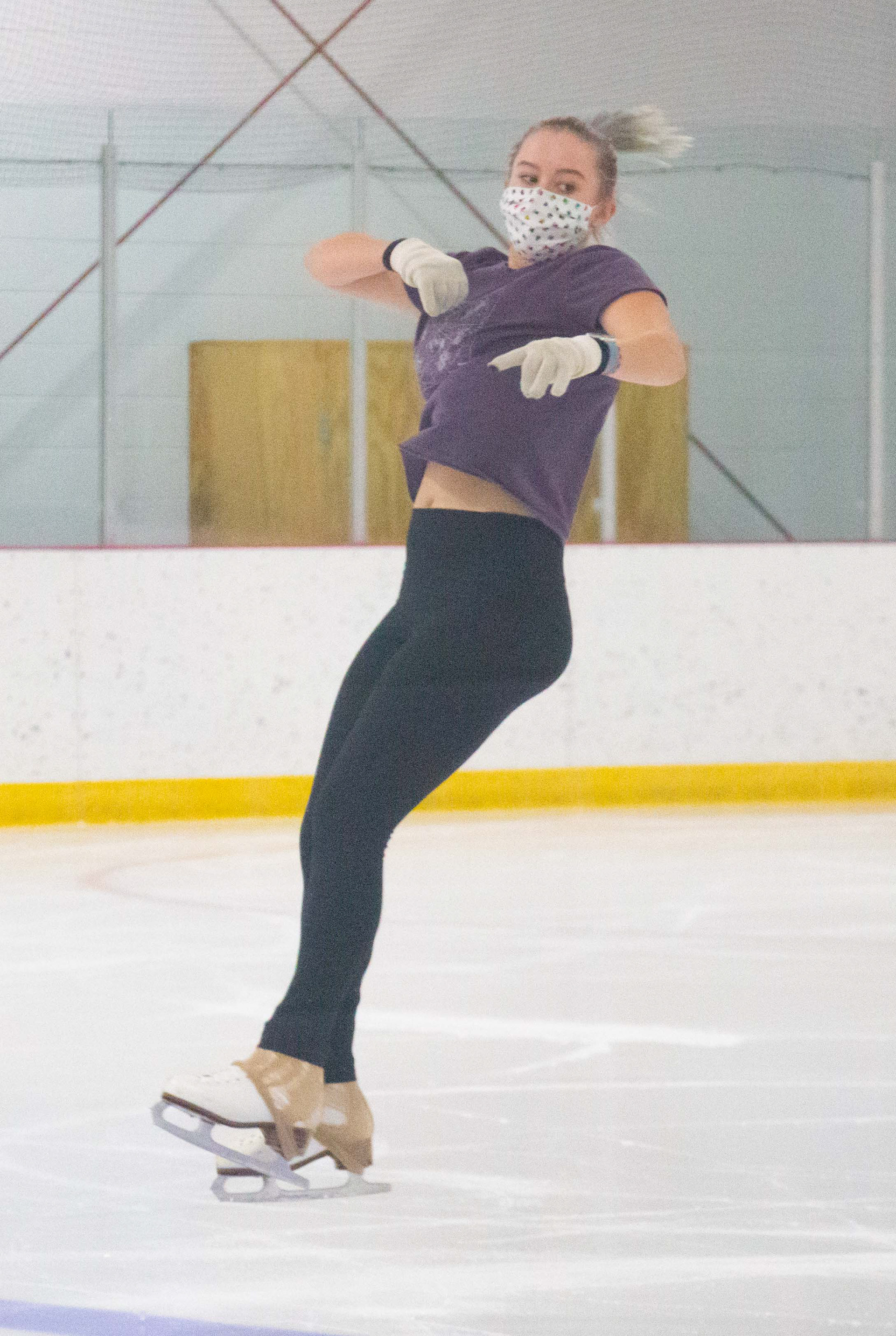 Jenna Harnick, practices a jump before her figure skating lesson on October 19, 2020. Harnick is also a figure skating teacher at the I.C.E. Arena, and she mentioned that it is great to be back on the ice.
