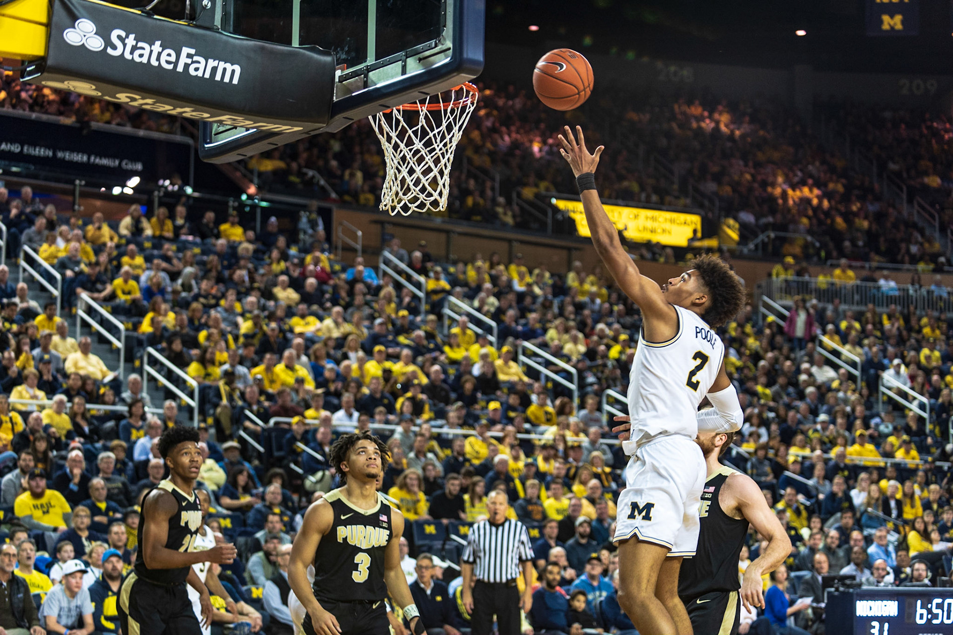 Jordan Poole scores at UM vs. Purdue in 2018