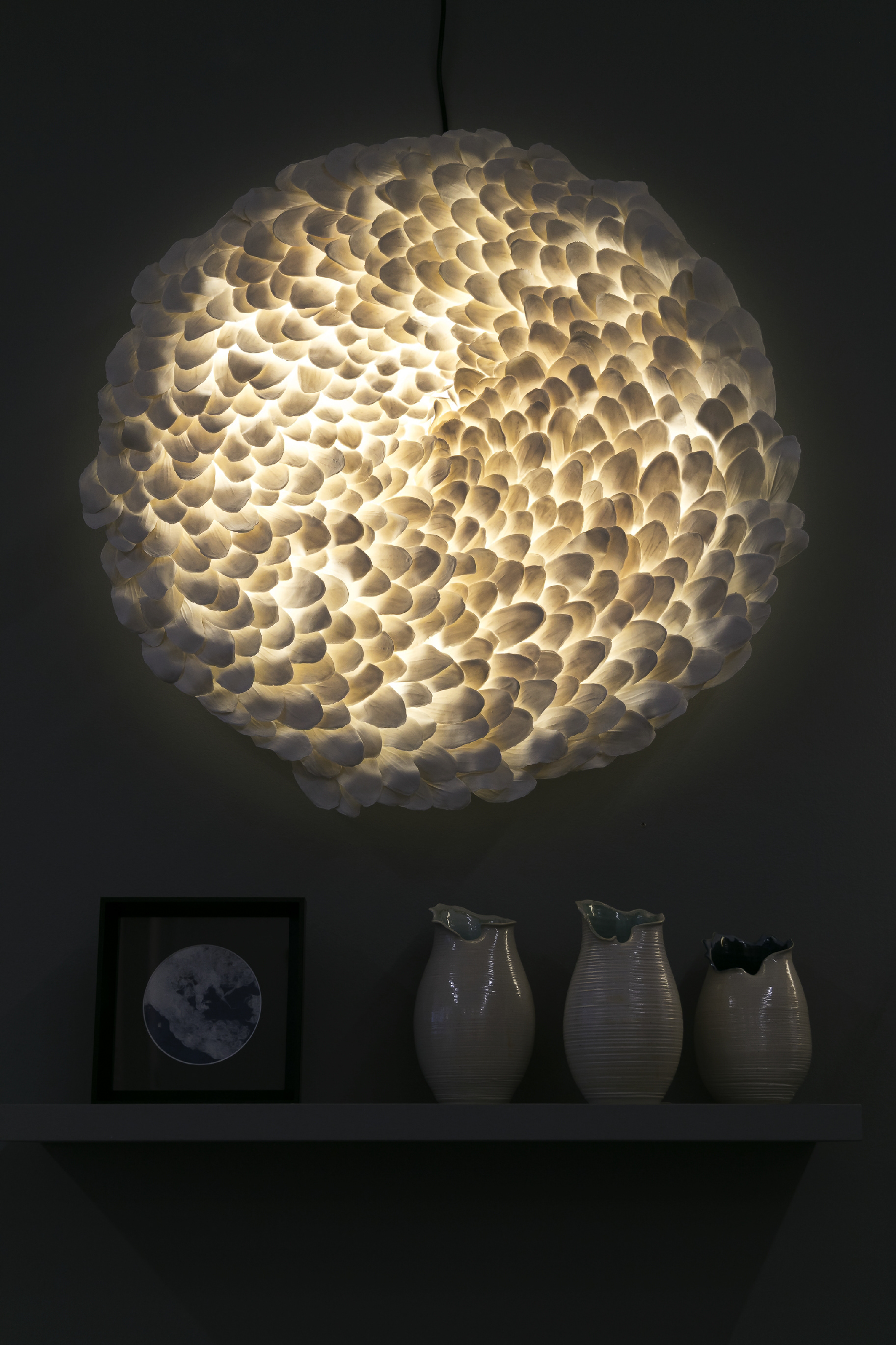 Applique murale luminaire Mezza LUCE au rez-de-chaussée du concept-store
