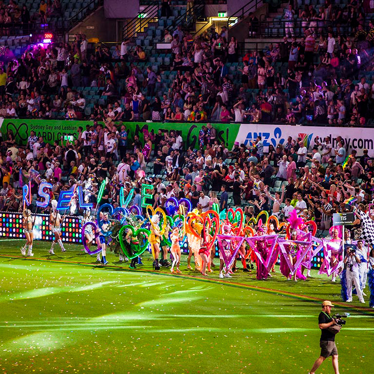 The Colours of Our Community float entry in action during the 2021 Sydney Mardi Gras Parade held at the SCG, 6th March 2021, by photographer Markham Lane.