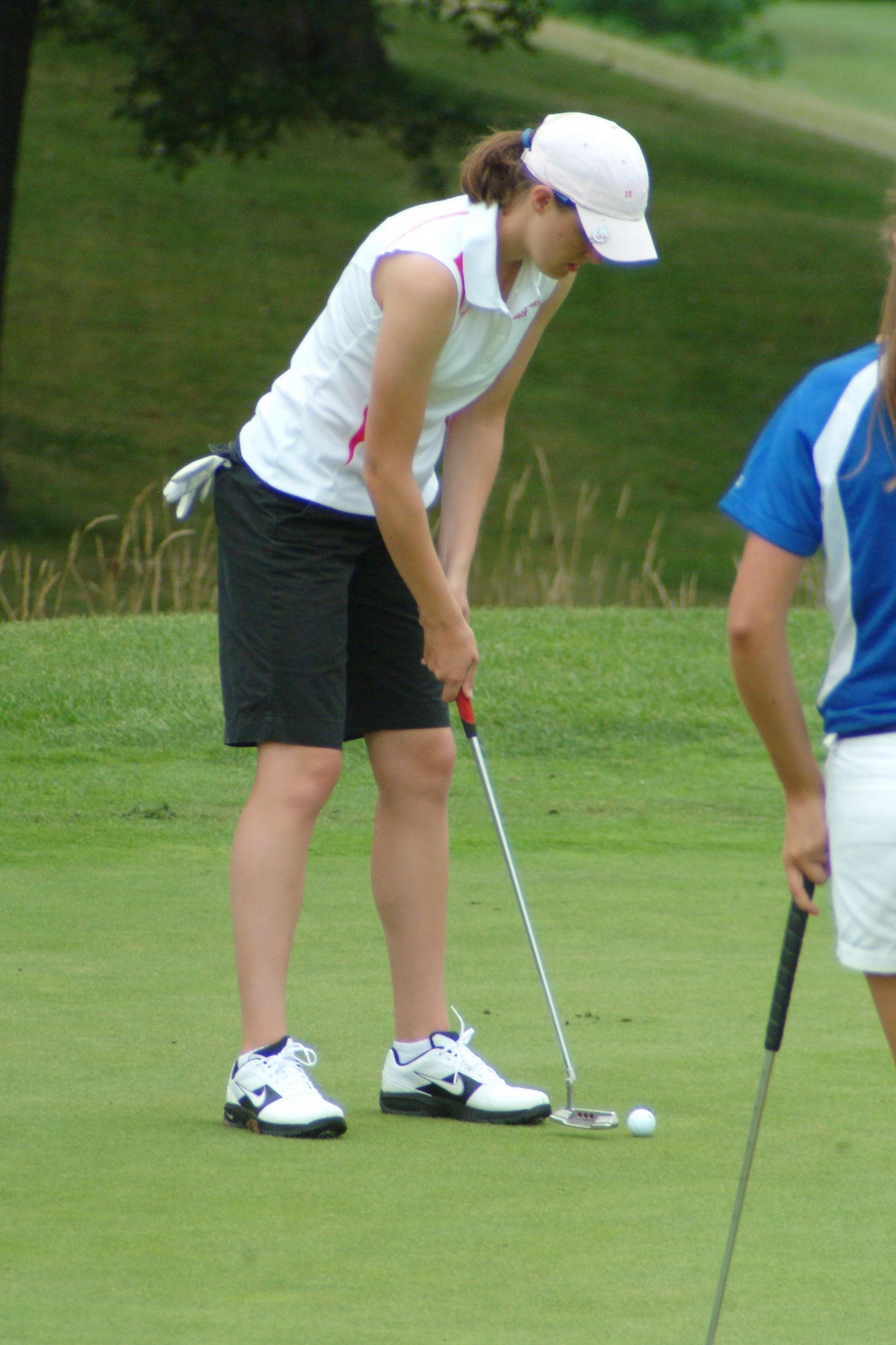 080709tvmGLFLCINVITE_5 Tony V. Martin CRETE-Crown Point junior Carolyn Kupchik on the 9th green. Girls Invitational at Longwood Country Club on Friday.