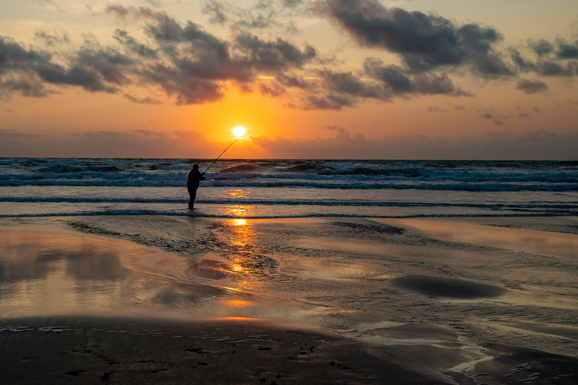 Fisherman at sunset, Widemouth Bay, Cornwall
