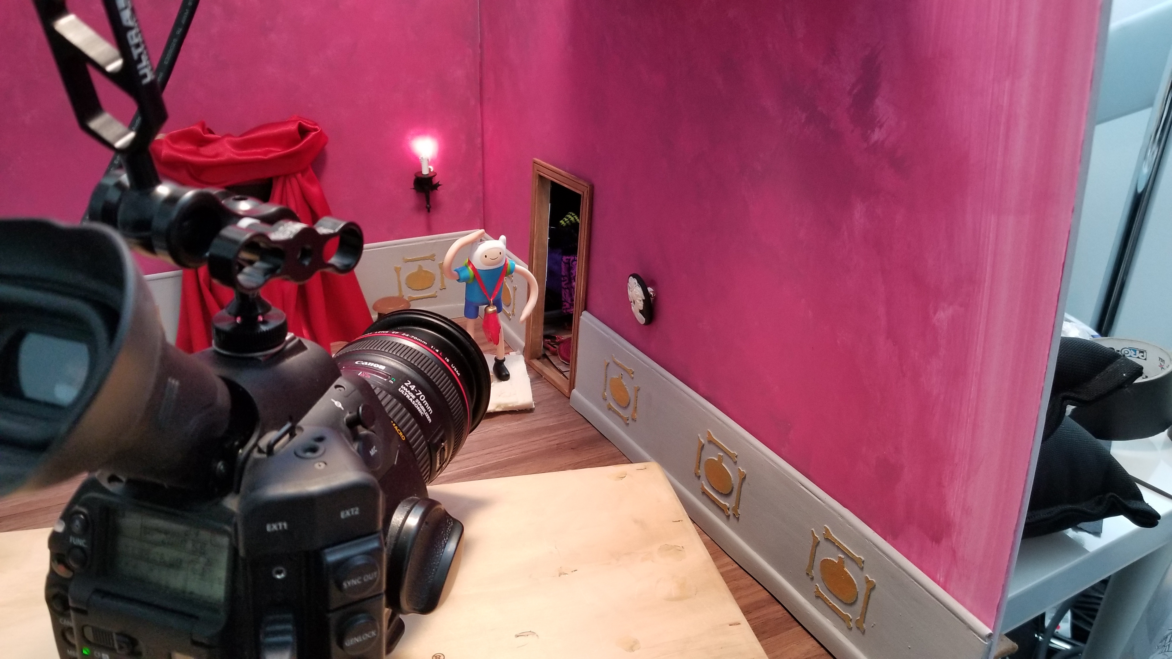 Finn stood in for scale and lighting reference. The wall molding is hand crafted, the wall sconce is 3D printed.