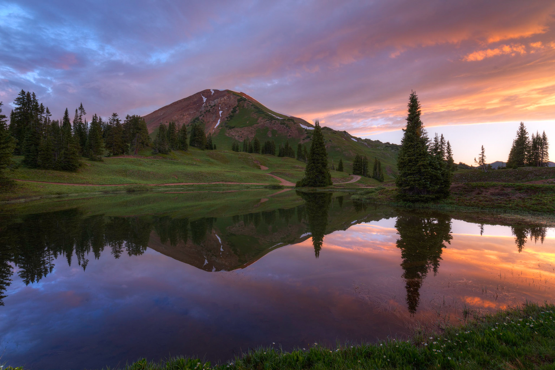Reflections of the dawn clouds and Cinnamon Mountain in a small, unnamed lake at the top of Paradise Divide, near Crested Butte.Crested Butte, ColoradoJuly 13, 2017This is an HDR image consisting of 3 exposures merged in Photomatix Pro. Additional processing in Lightroom and Photoshop.PENTAX K-1, HD PENTAX-D FA 15-30mm F2.8ED SDM WRISO 100 16 mm  ¼ sec at ƒ / 16