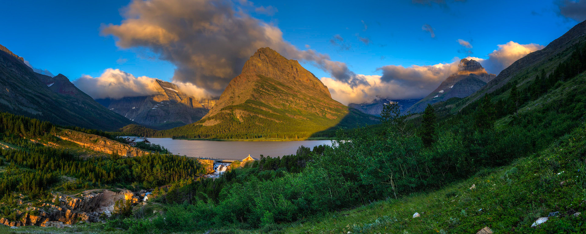 Shortly after sunrise near the Many Glacier Hotel.  Glacier National ParkJuly 28, 2015This is an HDR panoramic image consisting of 5 frames comprised of 5 exposures each. HDR processing performed in Photomatix Pro.  Panoramic stitching performed in Photoshop. Additional processing performed in Lightroom and Photoshop.PENTAX K-3, Sigma 10-20mm f/4-5.6 EX DCISO 100 20 mm  ¹⁄₂₀ sec at ƒ / 11