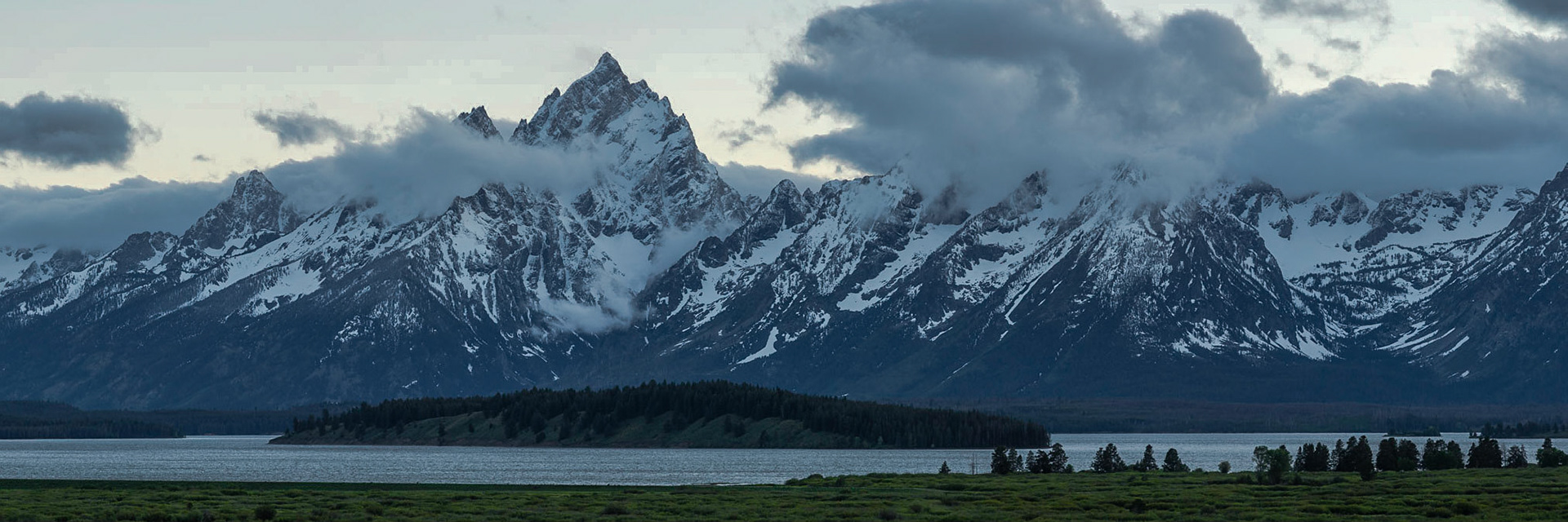 Late evening clouds over the Jackson Lake and the Teton Range.Grand Teton National Park18 June 2014PENTAX K-3, Sigma 18-250mm f/3.5-6.3 DC OS HSMISO 100 148 mm  ⅛ sec at ƒ / 8.0Prints of my work are available from my website at http://www.fingolfinphoto.comFollow me on Facebook at http://www.facebook.com/fingolfinphoto or http://www.facebook.com/pesterleAlso, http://500px.com/pesterle   http://www.flickr.com/photos/fingolfinphoto