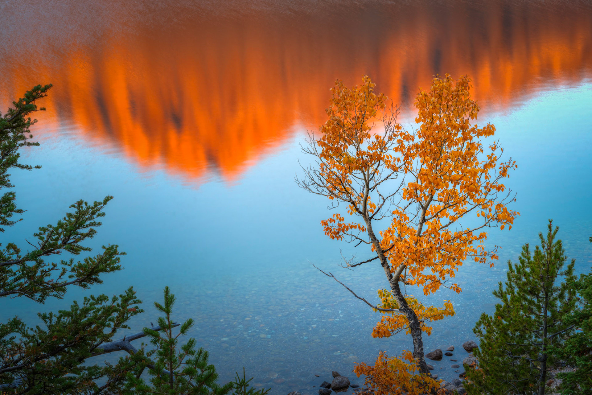 Reflections of alpenglow on Mount Moran at Jenny Lake.Grand Teton National ParkWyomingSeptember 28, 2016This is an HDR image consisting of 5 exposures merged in Photomatix Pro. Additional processing in Lightroom and Photoshop.PENTAX K-1, TAMRON 28-300mm F3.5-6.3 Ultra zoom XRISO 100 63 mm  2.0 sec at ƒ / 18