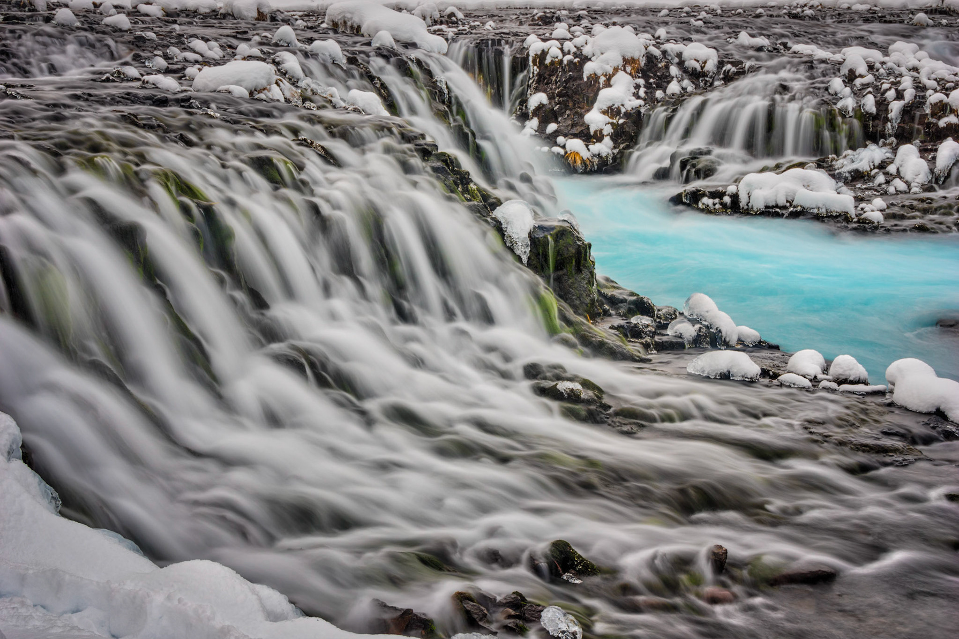 Side view of Brúarfoss, on the Brúará River, near Brekkuskógur, Iceland.Suðerland, IcelandJanuary 29, 2016This is an HDR image consisting of 5 exposures merged in Photomatix Pro. Additional processing in Lightroom and Photoshop.PENTAX K-3, Sigma 18-250mm f/3.5-6.3 DC OS HSMISO 100 32 mm  0.8 sec at ƒ / 11