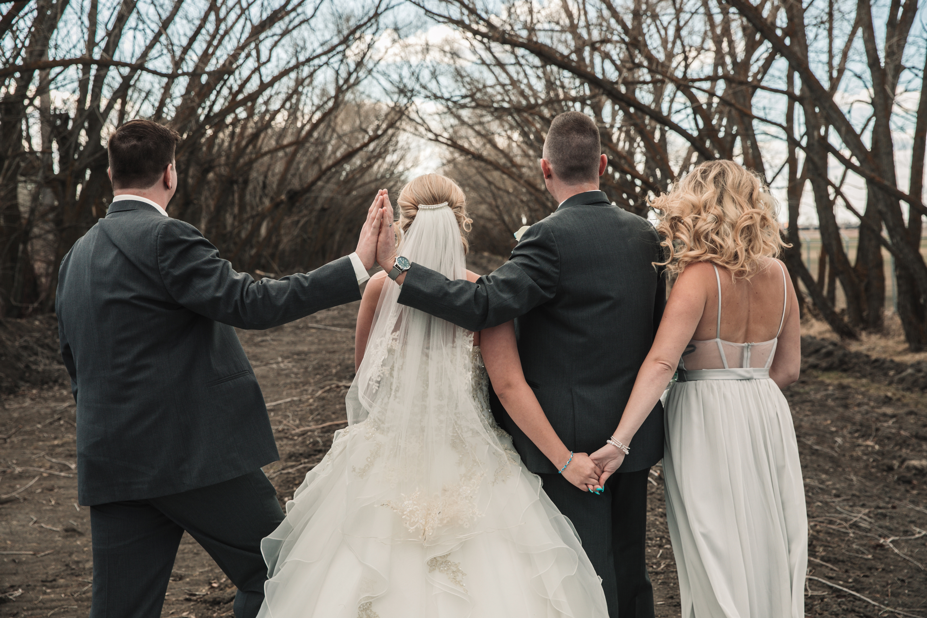 Bridal party walking in summer