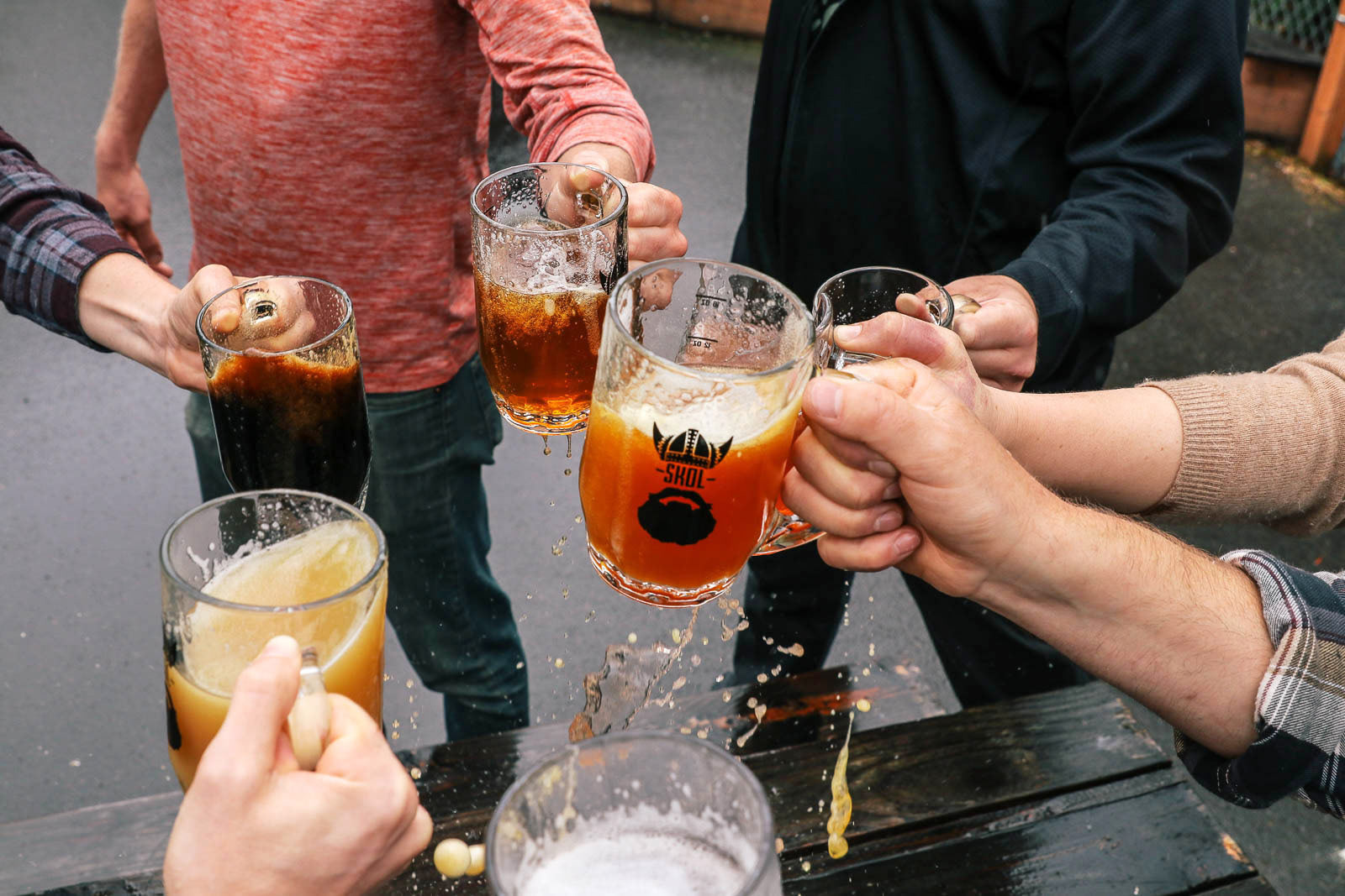 Viking Braggot Company employees gather to drink beer in photo for advertising material