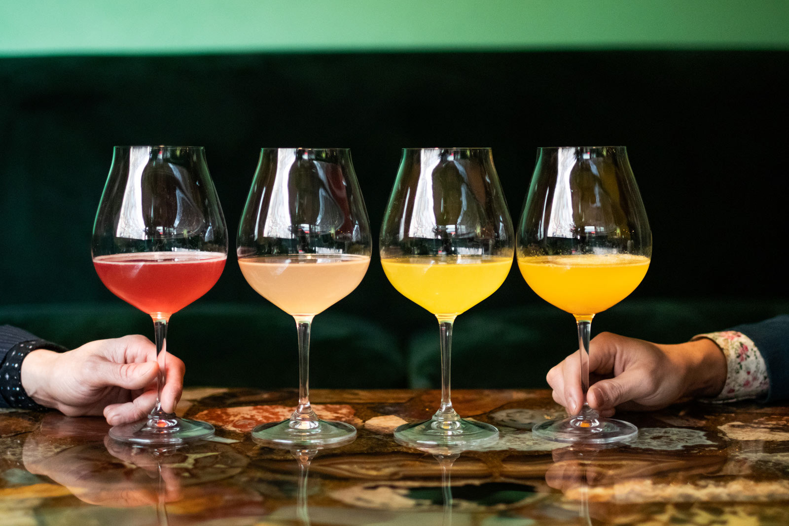A colorful selection of wines and cocktails placed on table at Party Bar