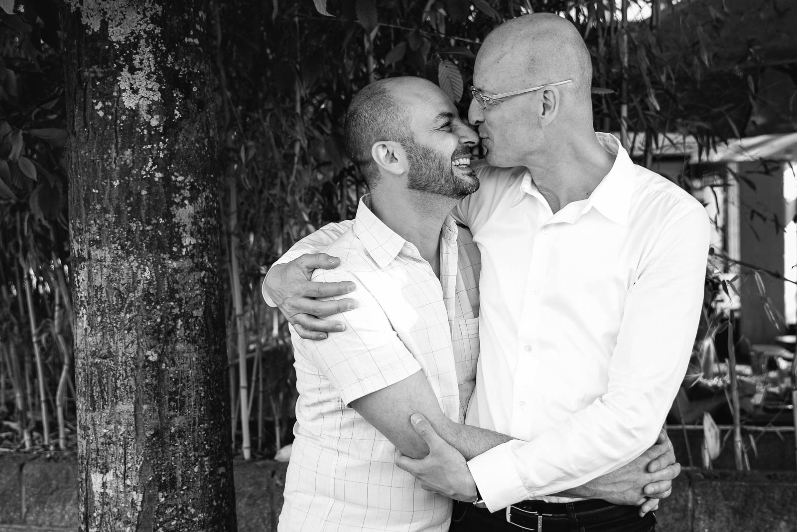 Happy same-sex couple celebrate their engagement, two men express their love
