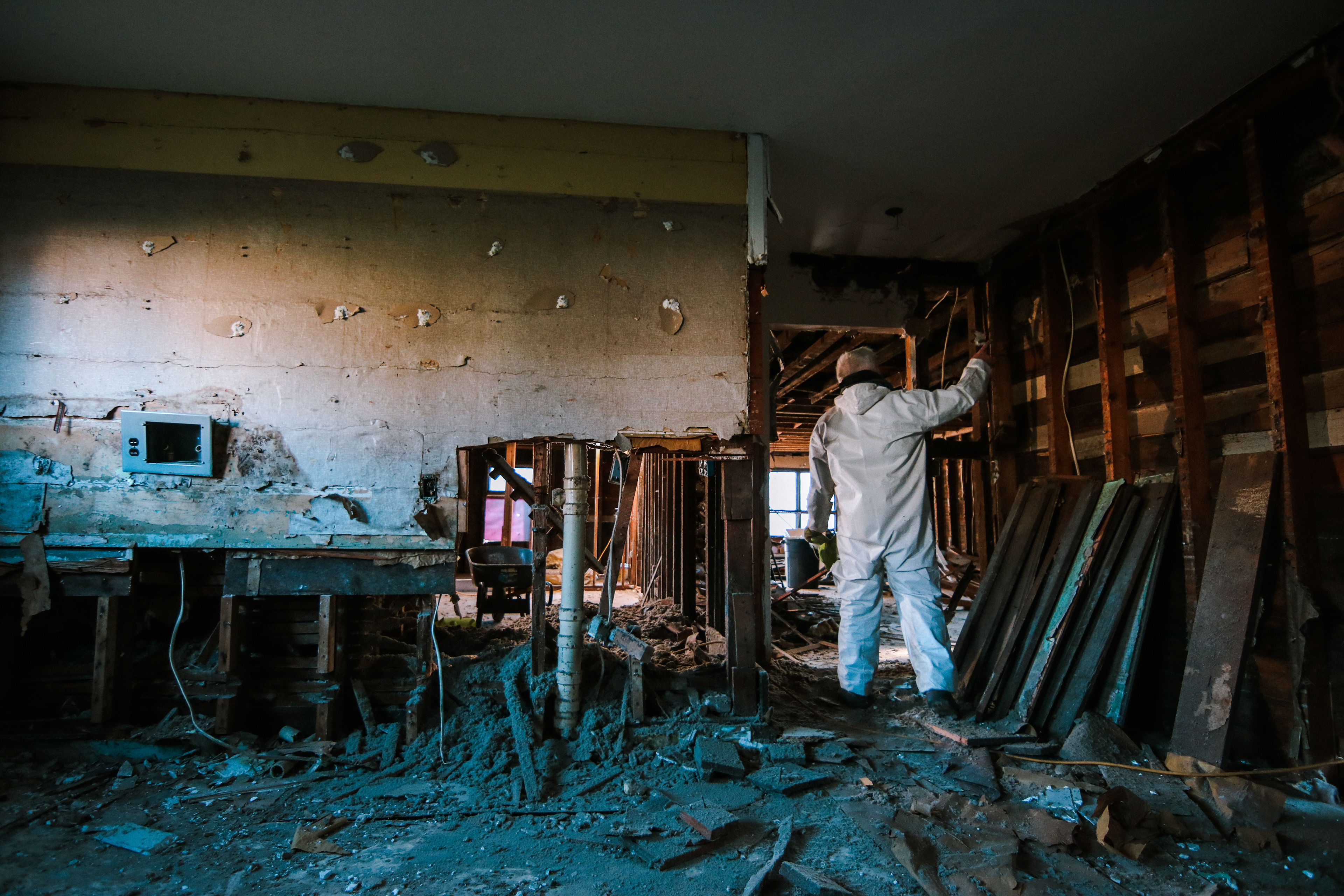 Michael Lawler points out old artifacts in his 100+ year old home.