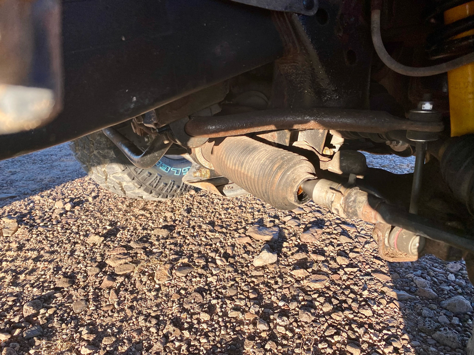 oh shit! tie rod bellows tore! must have happened after the alignment.