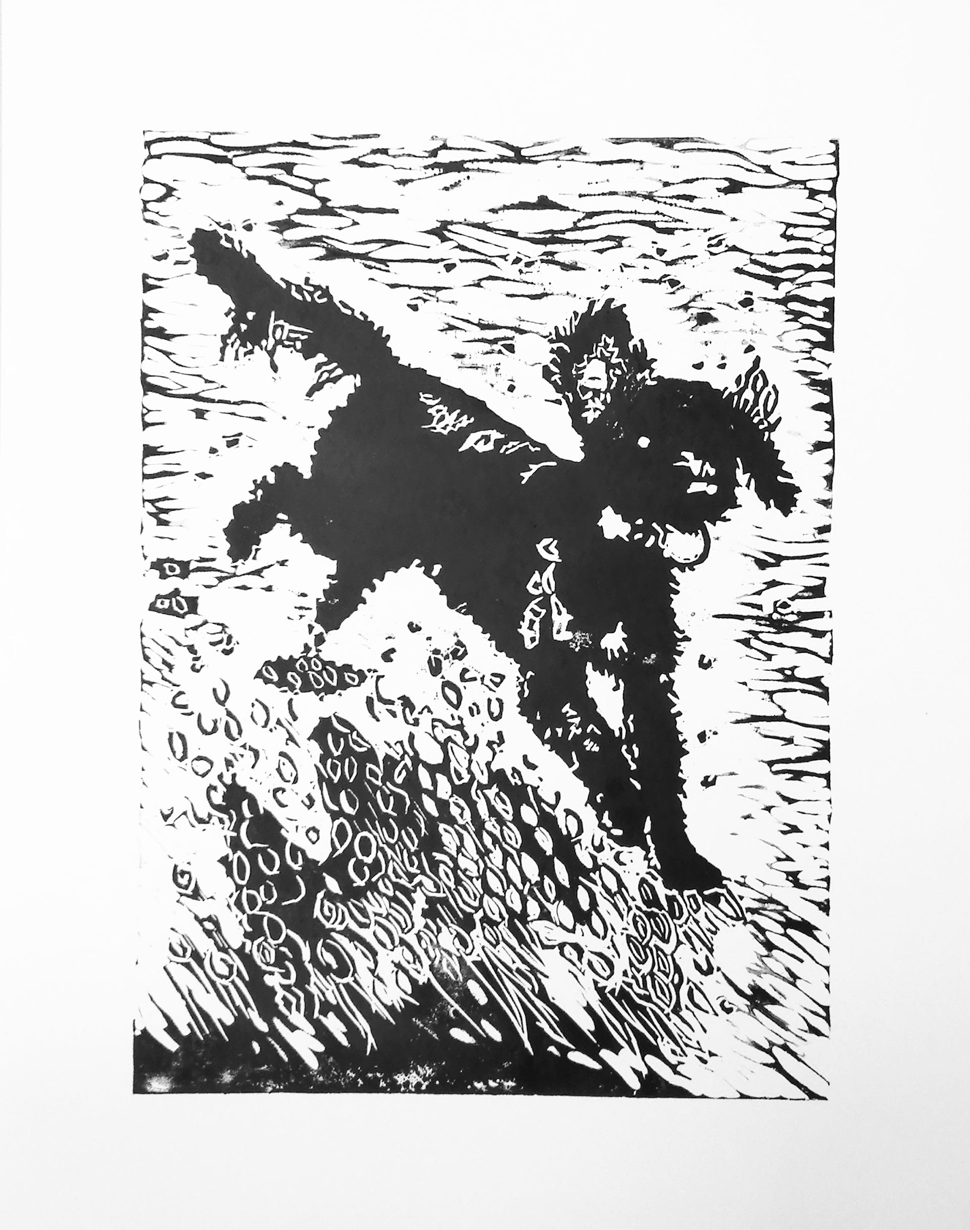black ink linocut of a cockapoo running along a beach