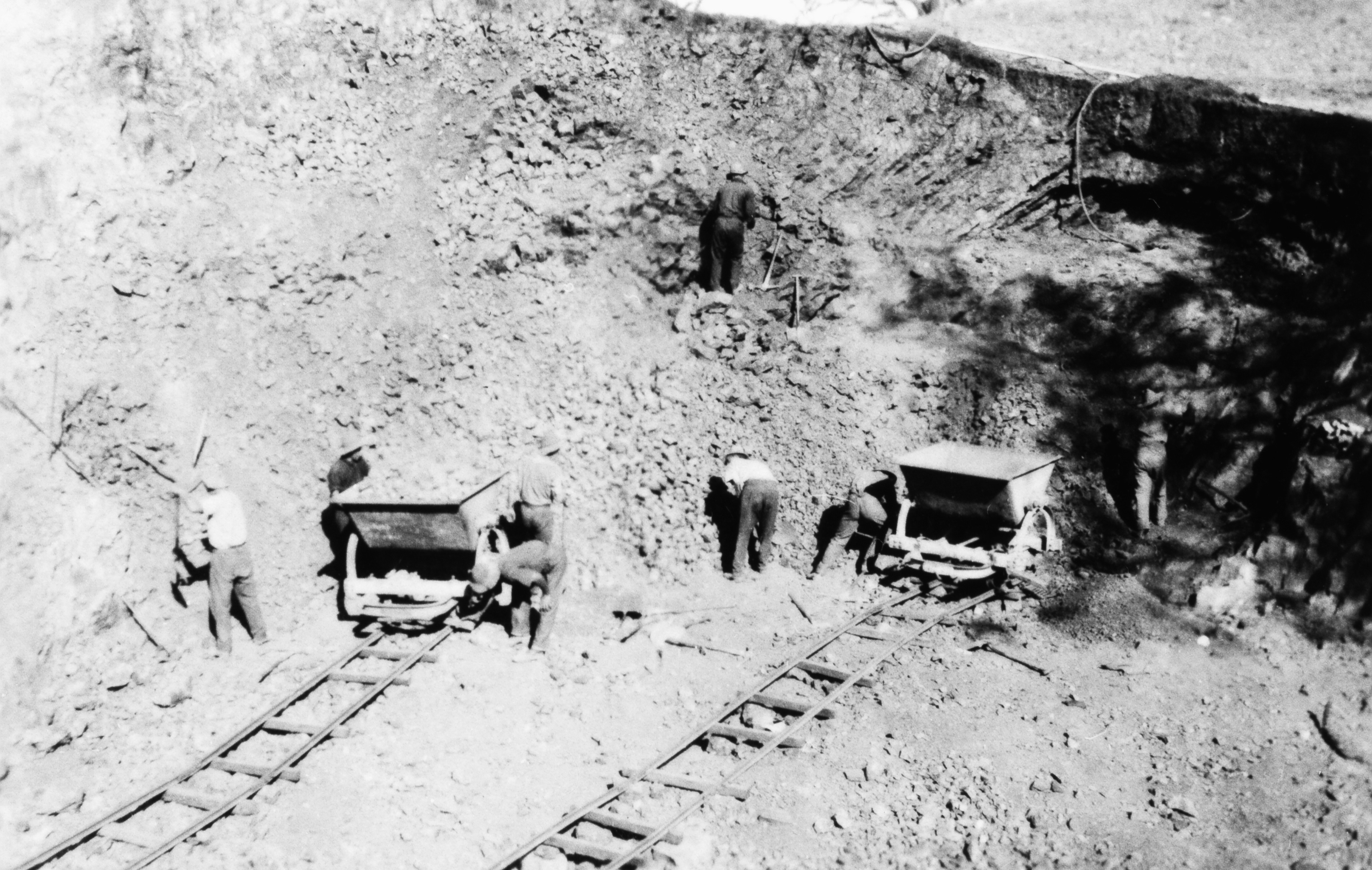 Black and White Photograph of Loading Trucks at Clifton Quarry