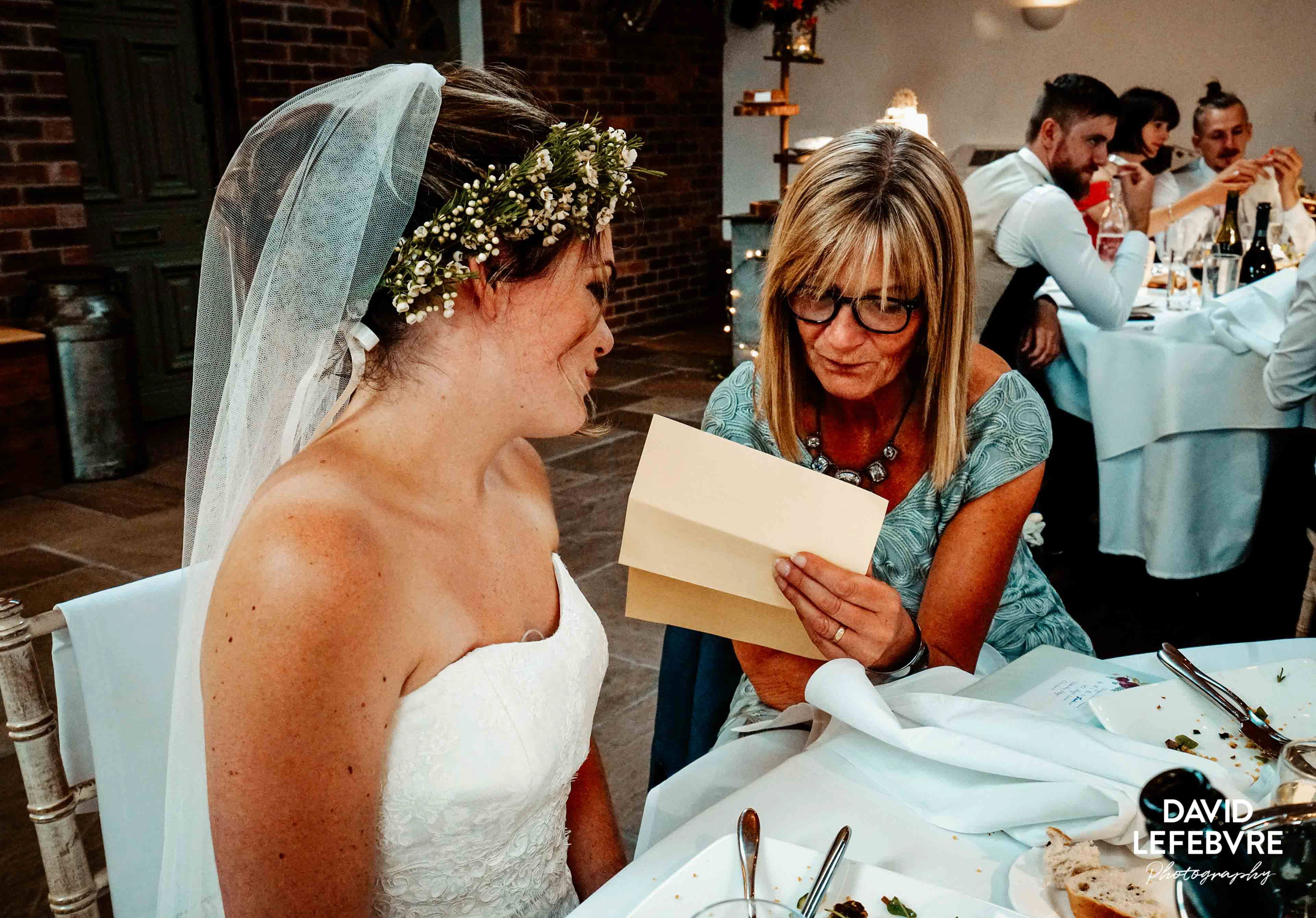 mother looking at speech notes in owen barn house venue
