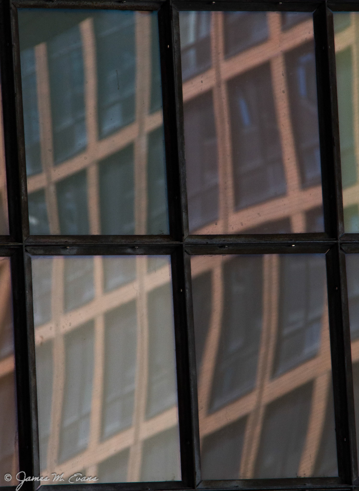 NYC Panes - Relrections of reflects in lower Manhattan, NYC.