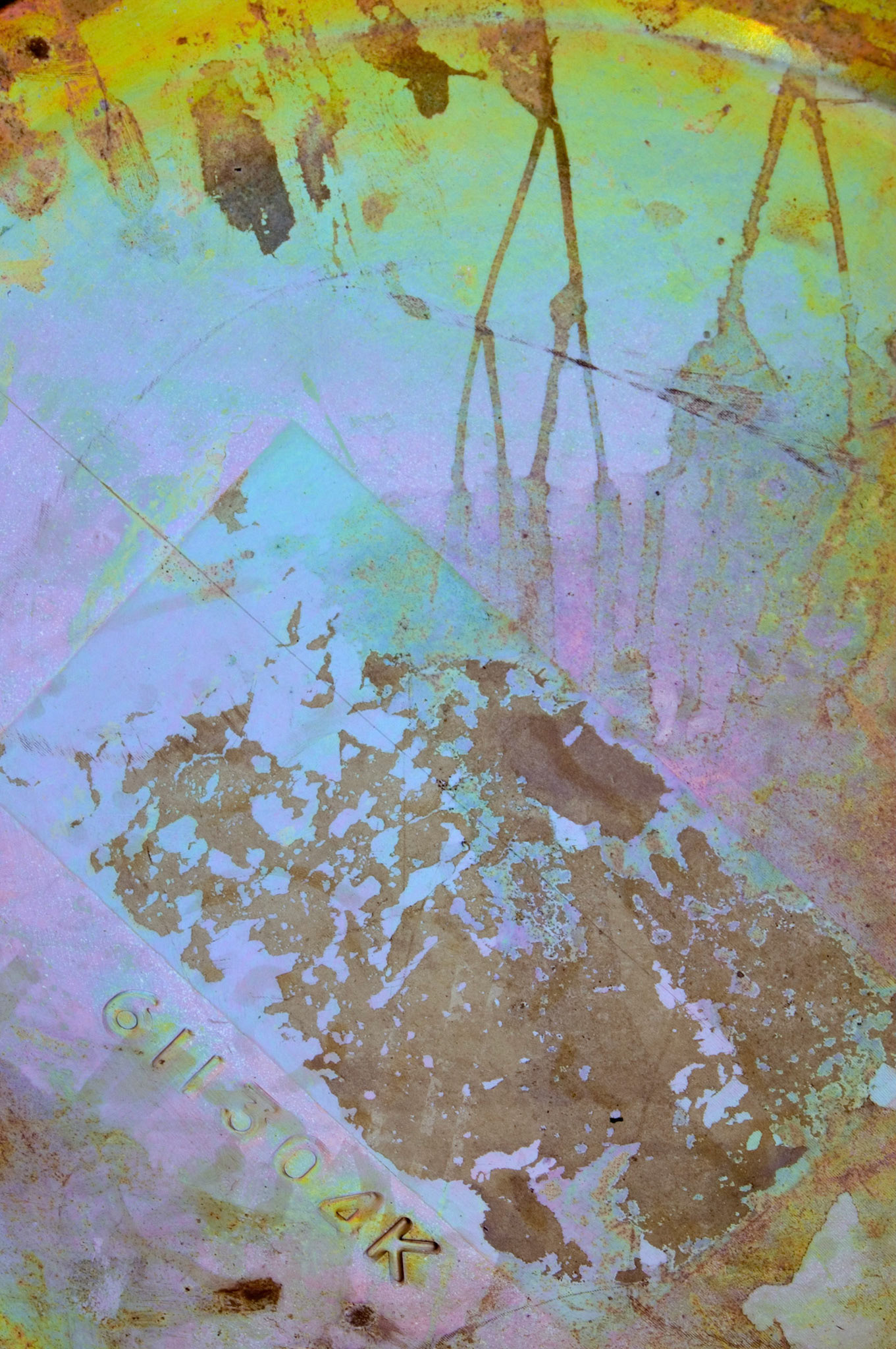 The colorful and shiny metal end of a barrel at Cohen's junkyard in Ottawa in Ontario Canada.