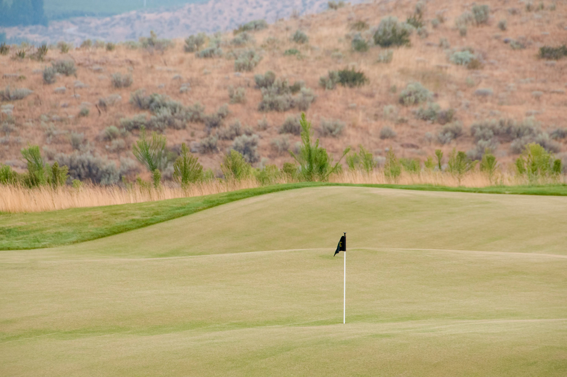 The view of the putting green from the Inn at Gamble Sands near Brewster Washington.